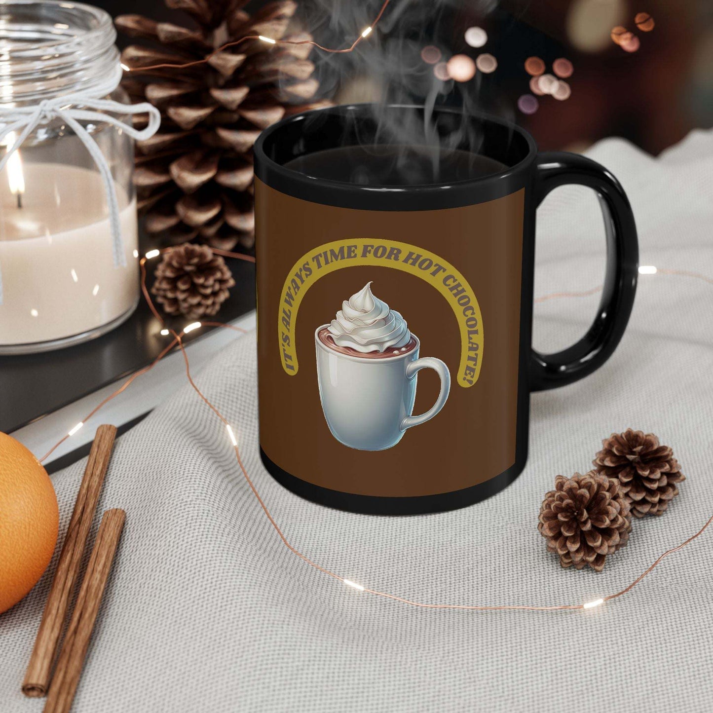 Black ceramic mug with hot chocolate design, glossy finish, perfect for hot beverages.