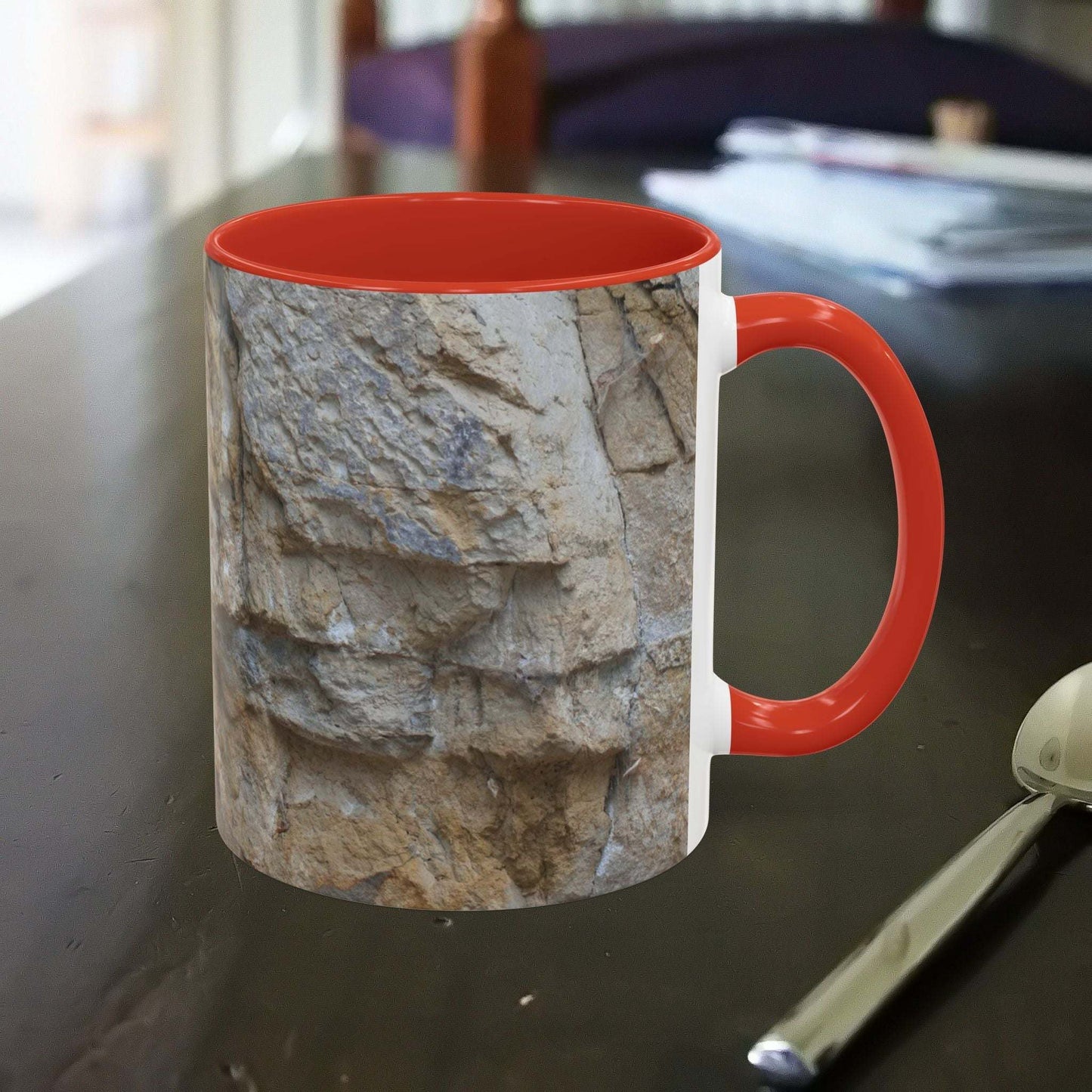 Rocky Mug with mountain design featuring falling rocks for nature lovers.