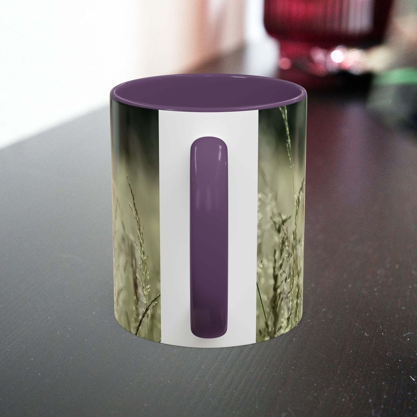 Ceramic mug with flowering grass design, perfect for nature lovers.