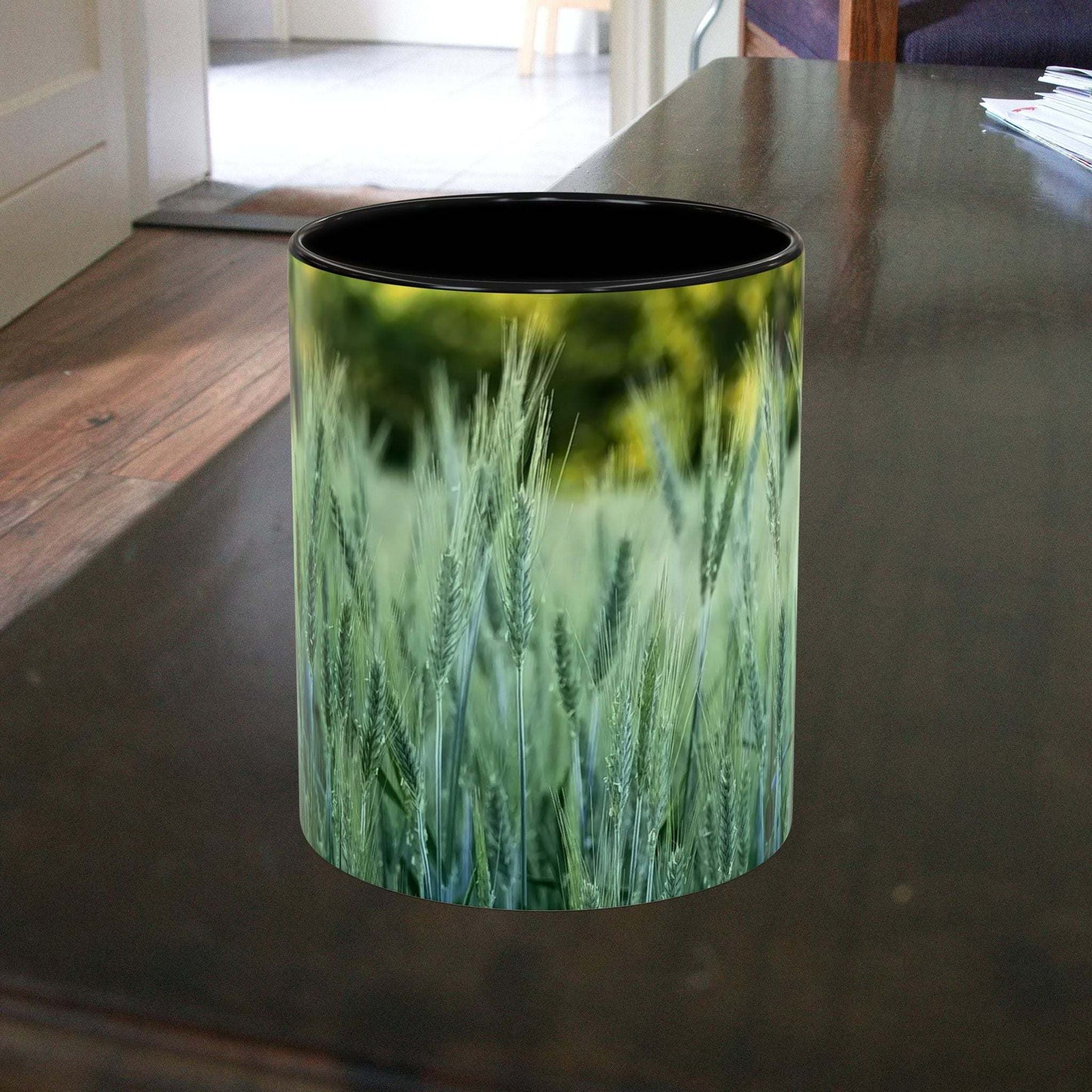 Wheat field design coffee mug on a table, ideal for nature lovers and gifting.