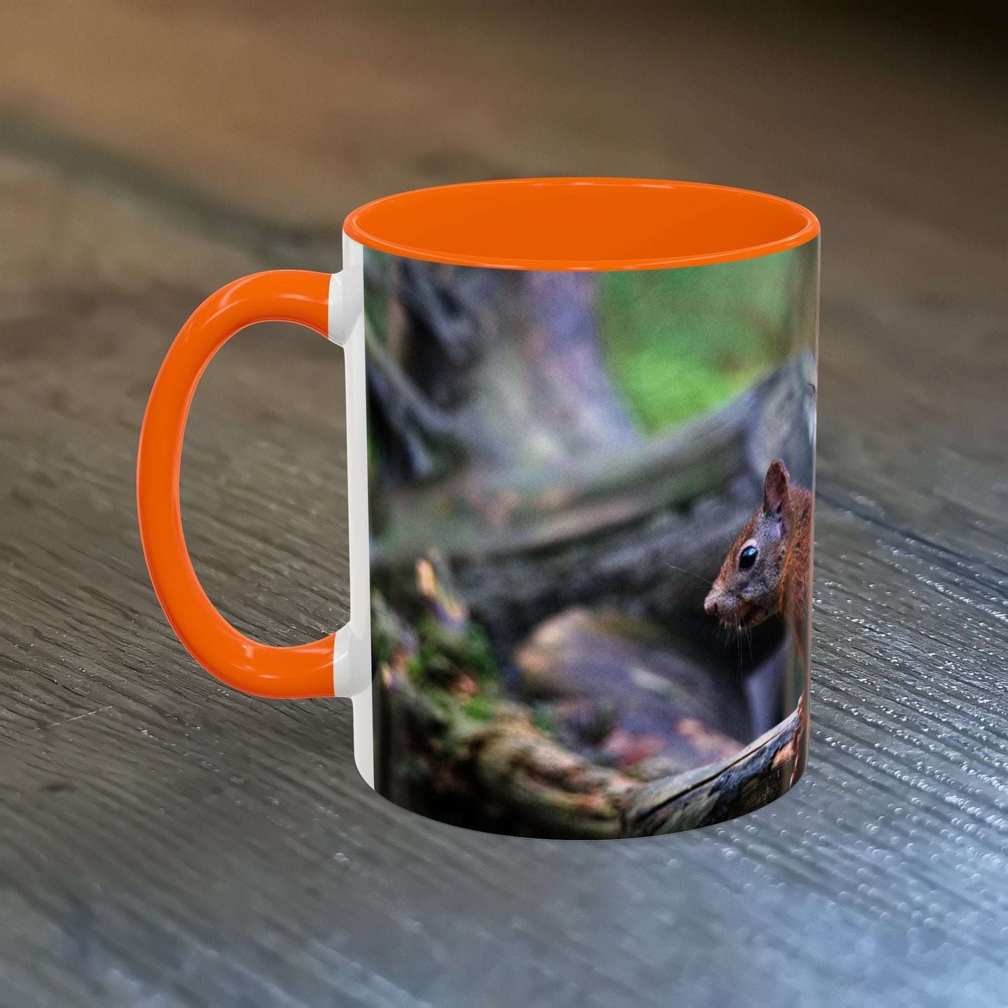 Adorable Squirrel Ceramic Mug with orange handle, featuring nature-inspired squirrel illustration, 11oz size.