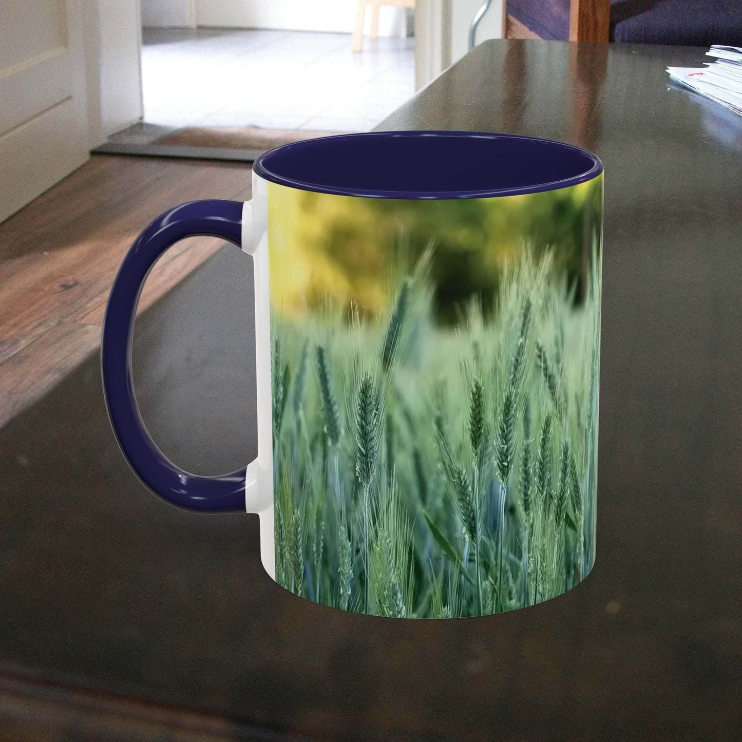 Wheat field design coffee mug with serene nature imagery.