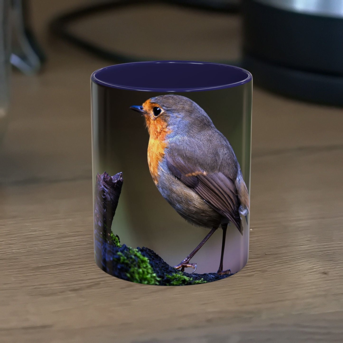 White ceramic 11oz mug with vibrant robin illustration, perfect for coffee or tea.