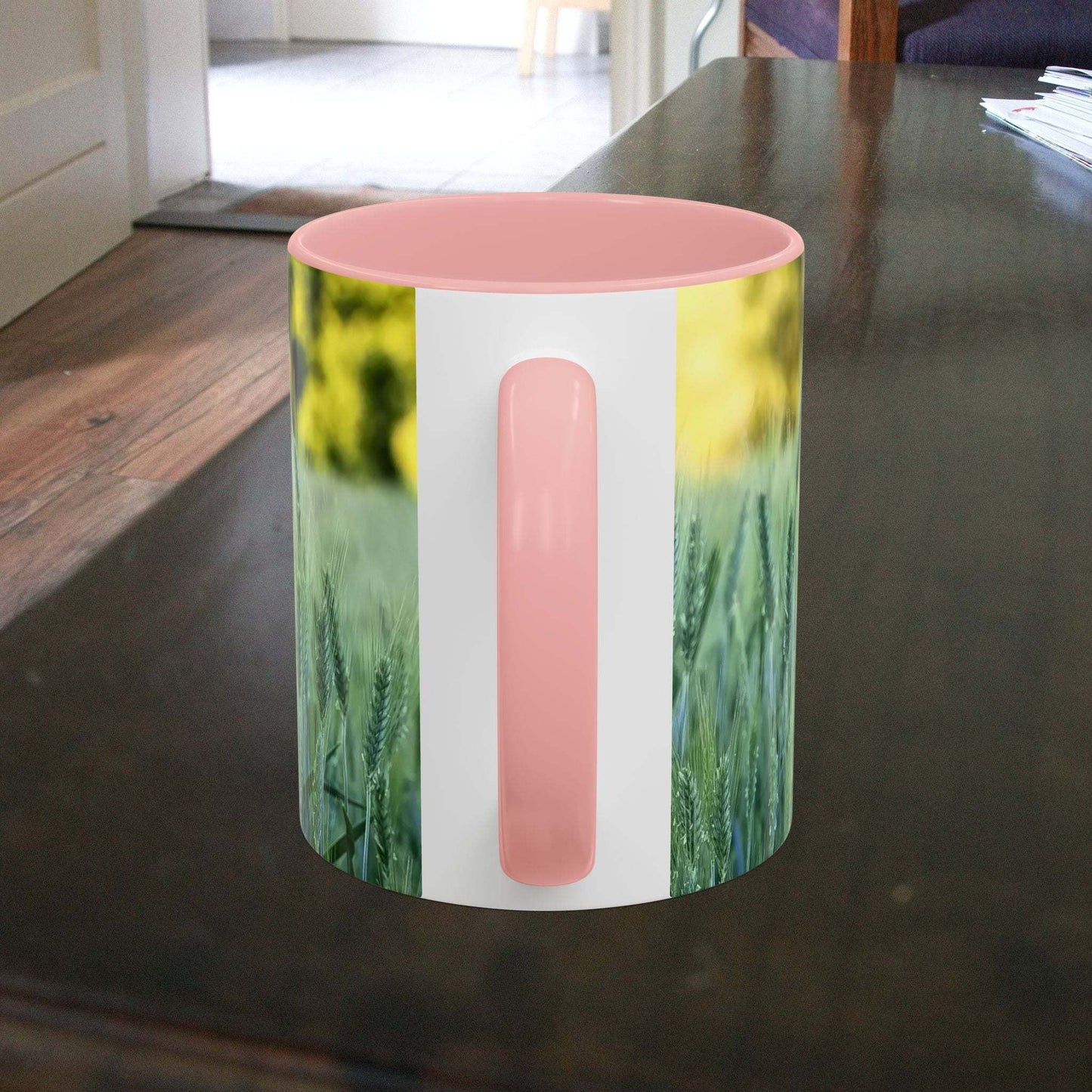 Wheat field design coffee mug with pink interior, perfect for nature lovers.
