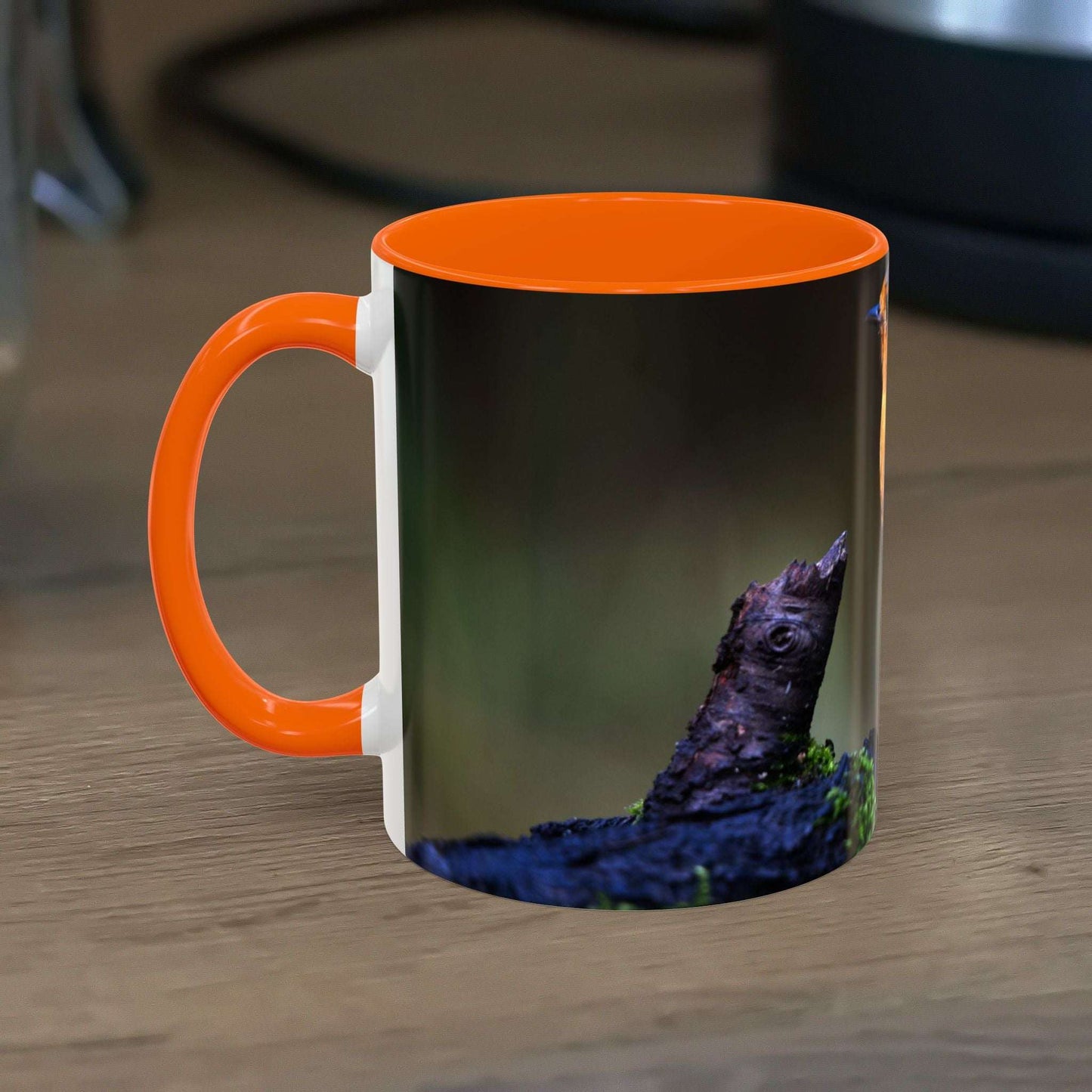 White ceramic 11oz Robin Mug with vibrant bird illustration, perfect for coffee or tea.
