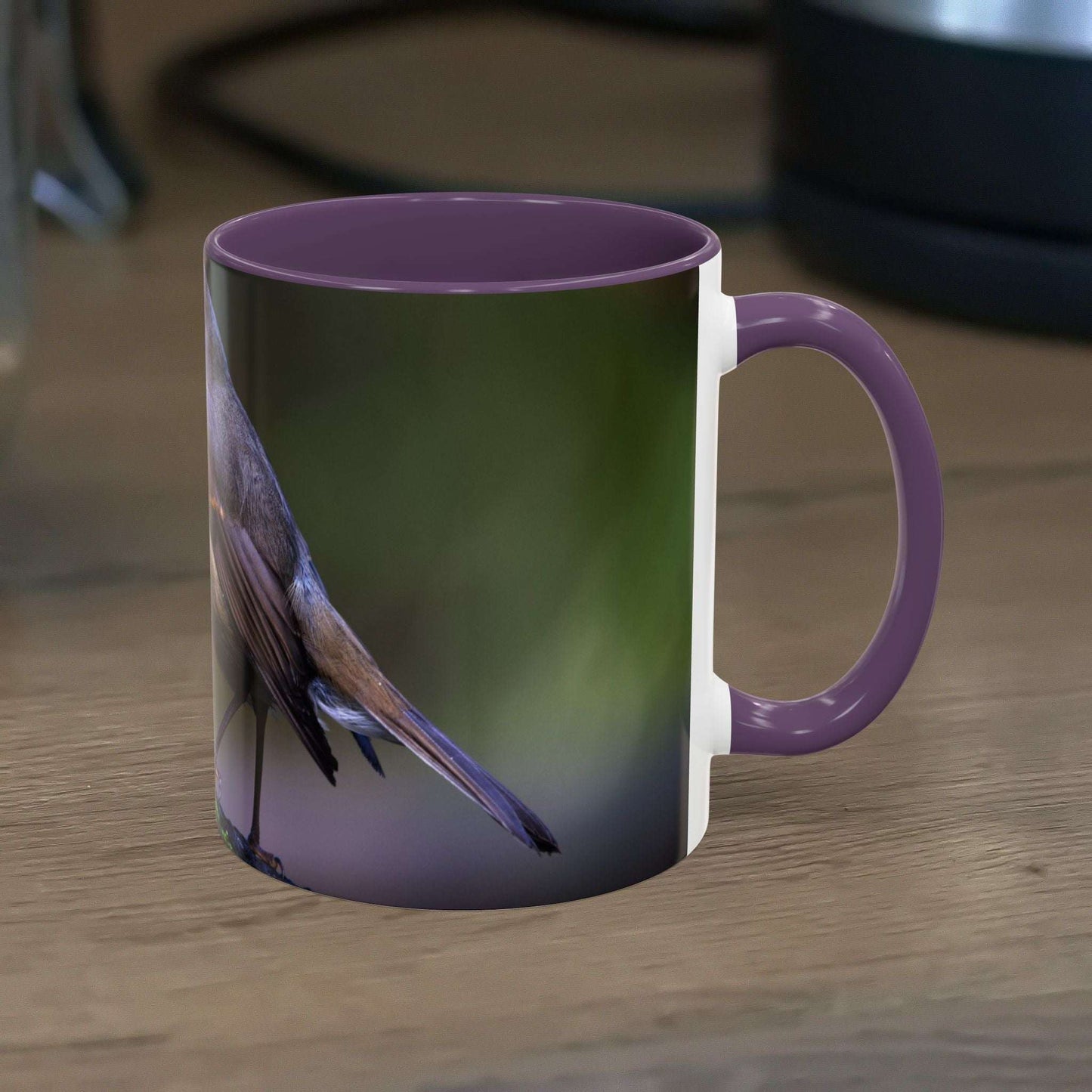 White ceramic 11oz mug with a vibrant robin illustration, perfect for nature lovers and birdwatchers.