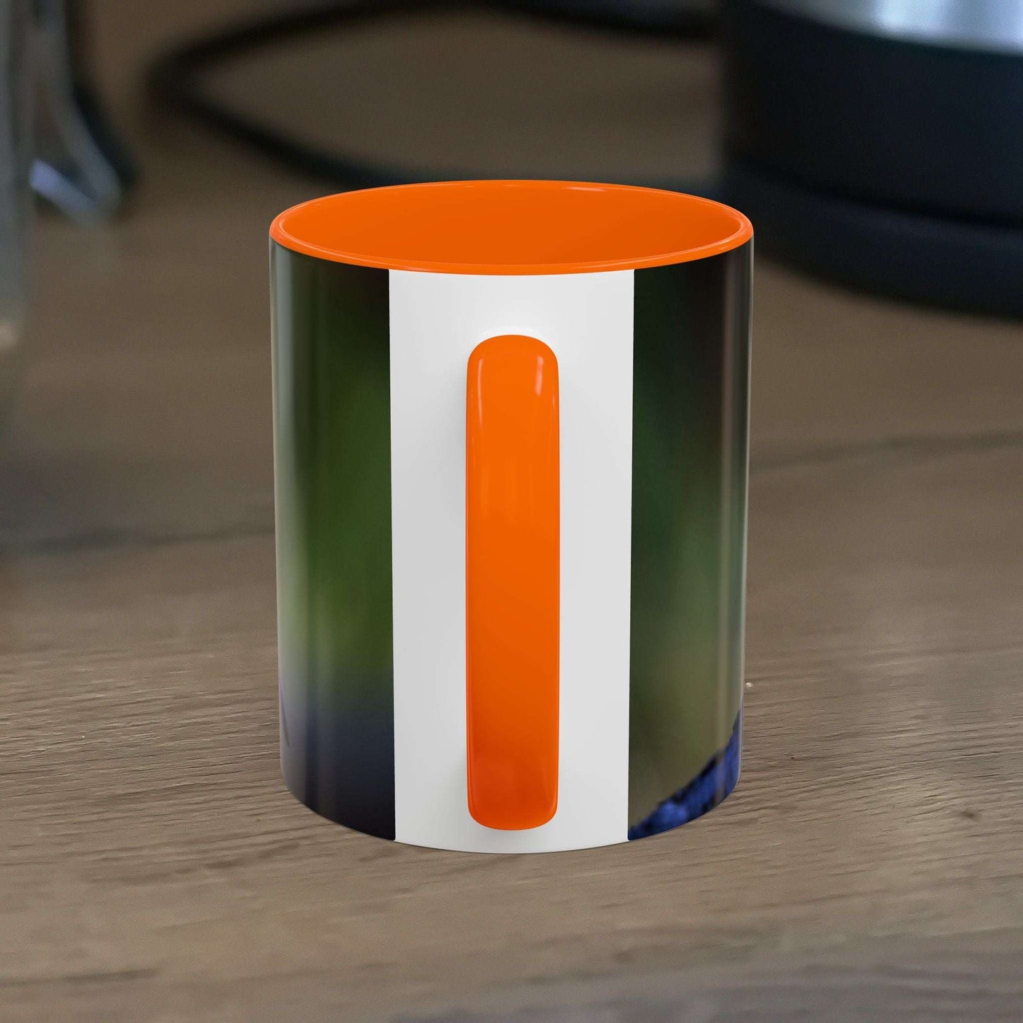 White ceramic 11oz Robin Mug with orange handle and rim.