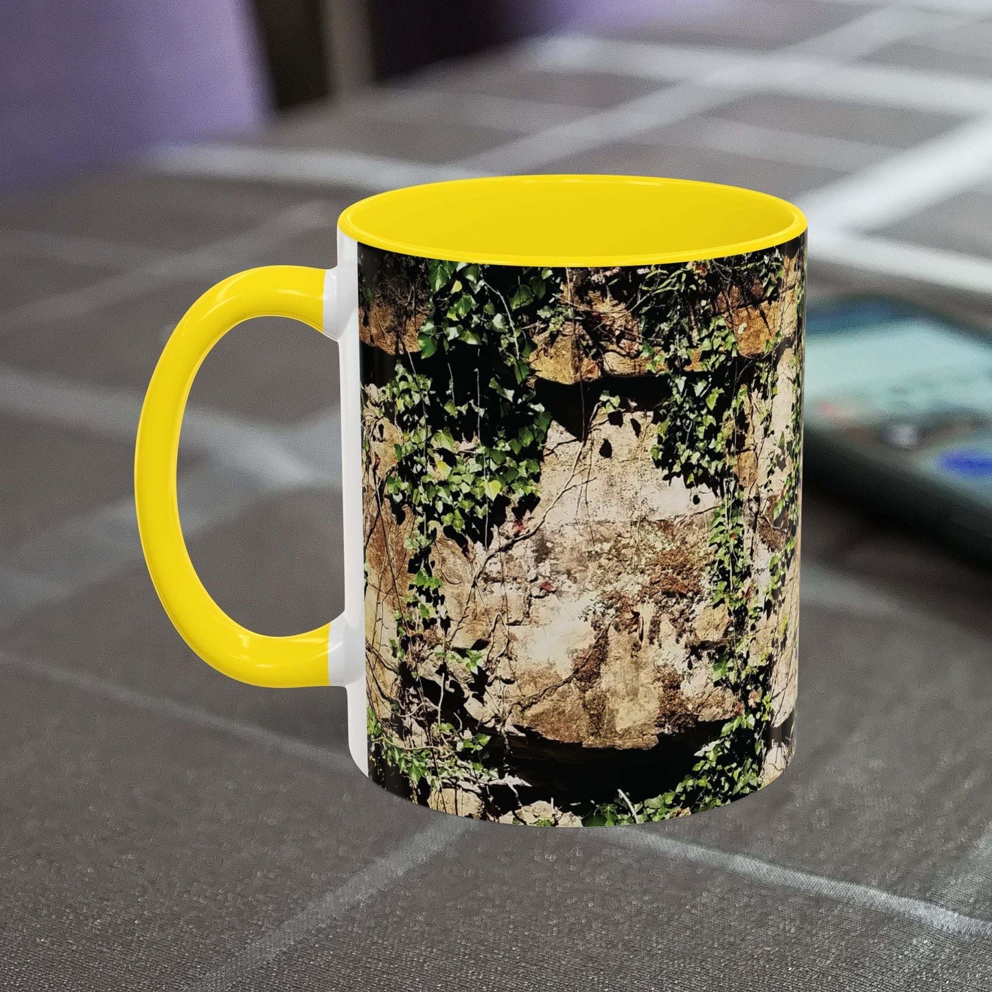 Overgrown Rocks Adventure Mug with nature-inspired design on table.