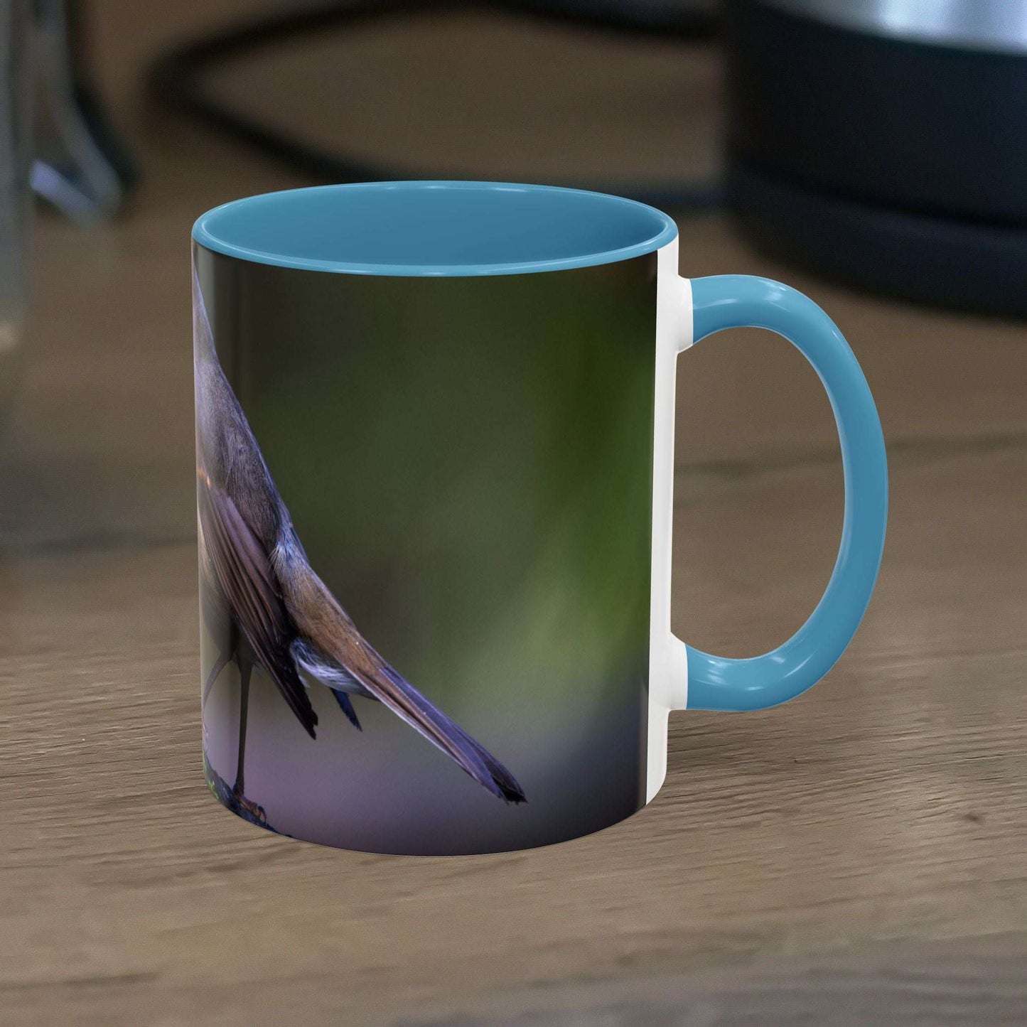 White ceramic Robin Mug with robin illustration, 11oz capacity.
