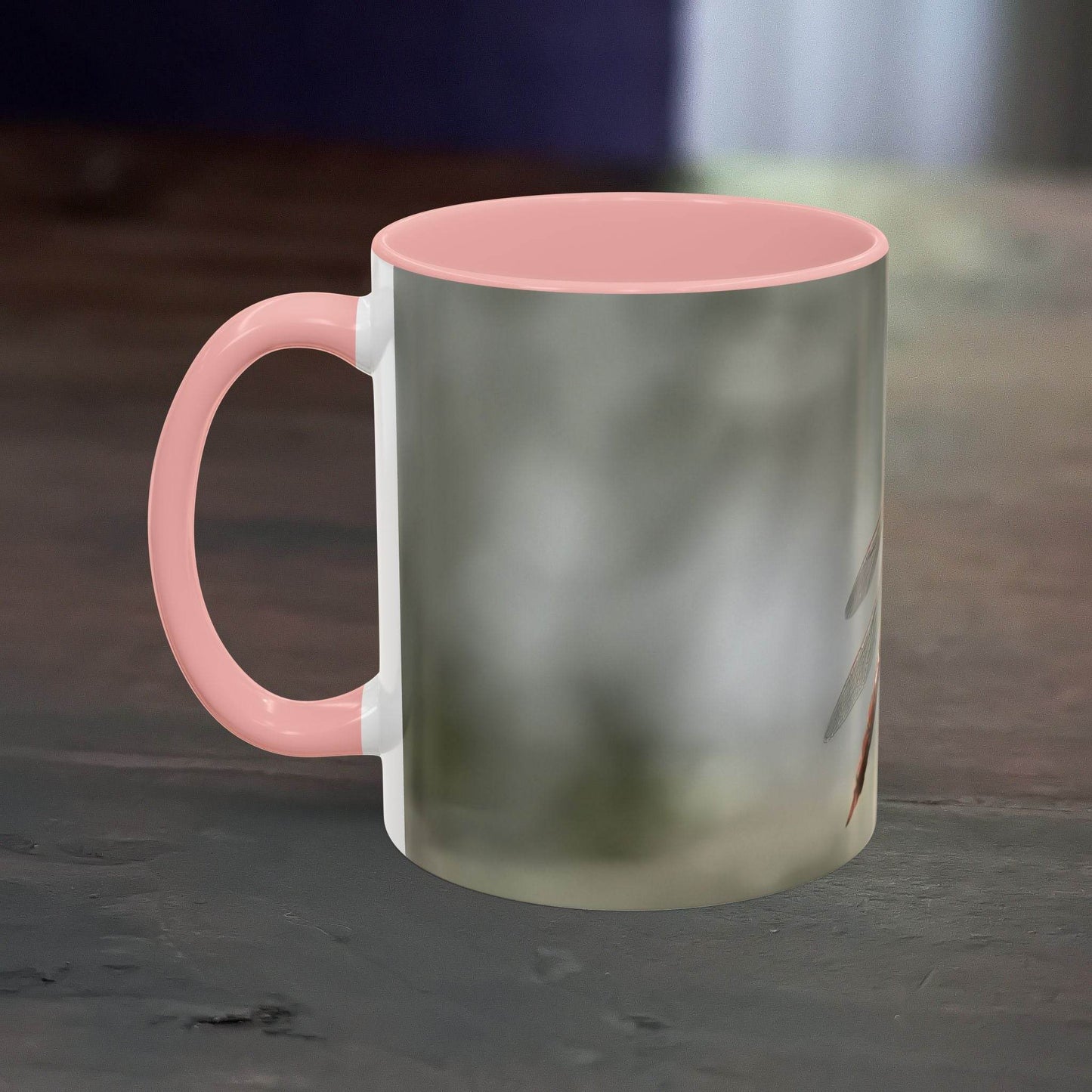 White ceramic mug with pretty dragonfly design, pink interior and handle, 11oz capacity.