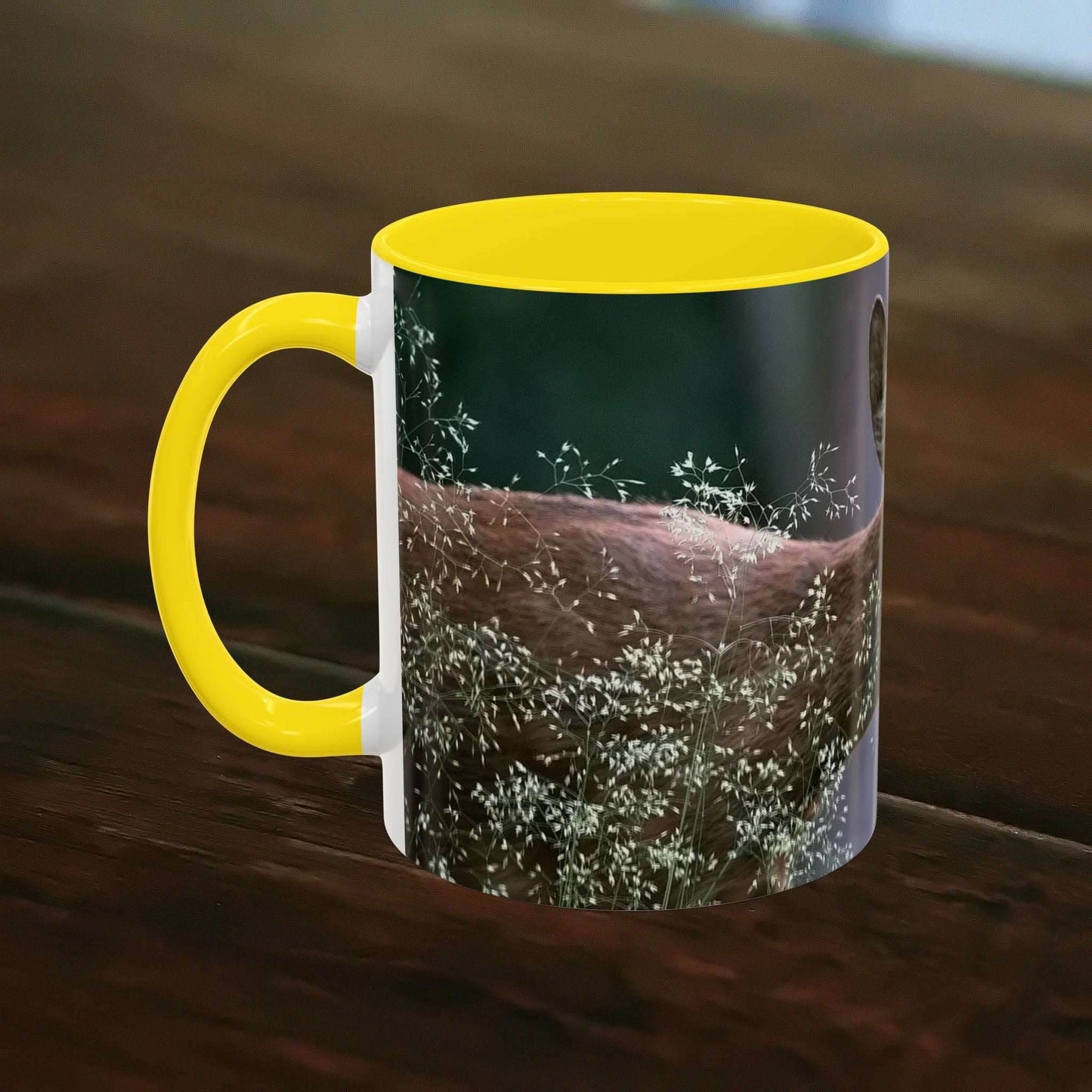 Nature-inspired deer ceramic mug with floral accents, yellow interior, and handle, 11oz.