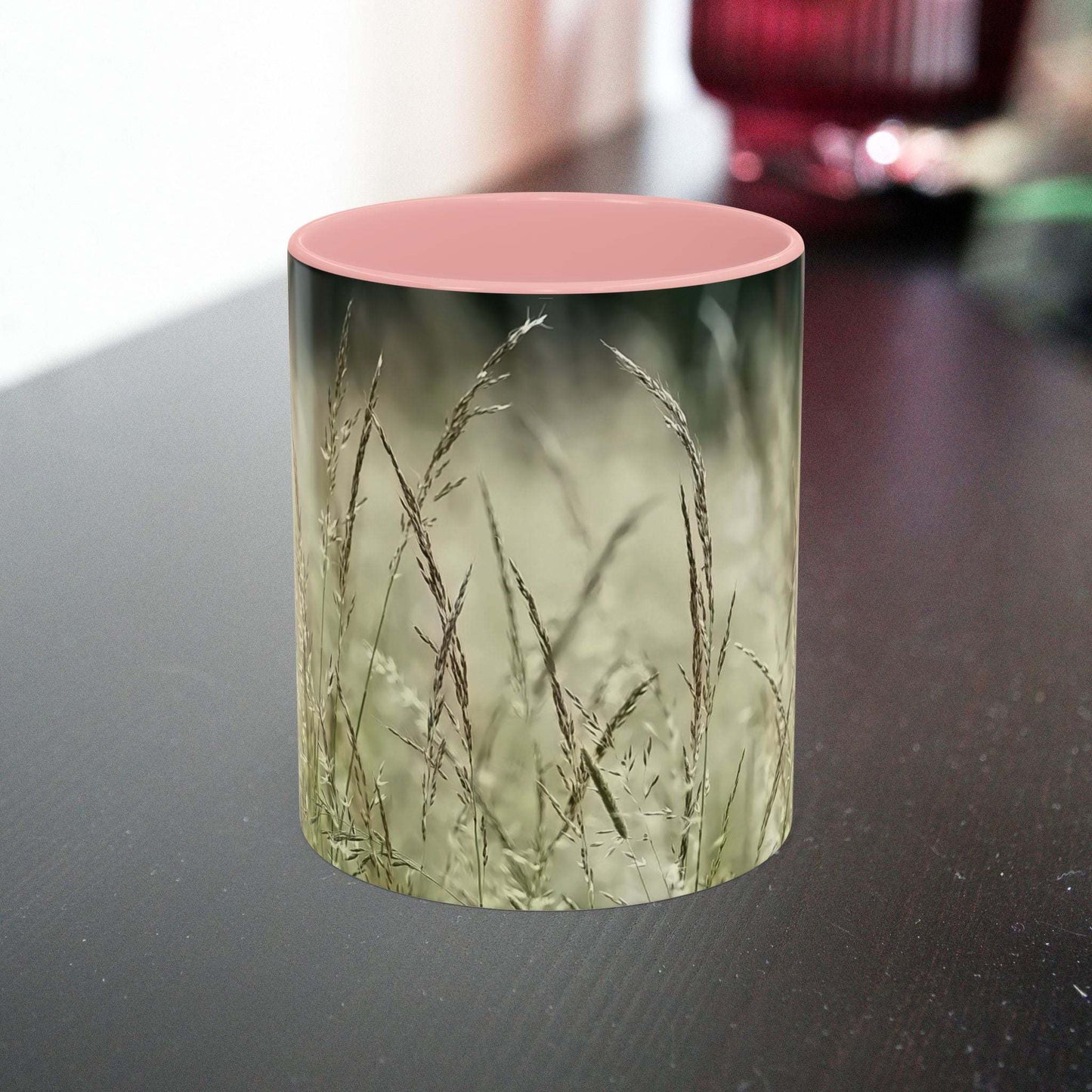 Flowering grass ceramic mug with serene nature design.