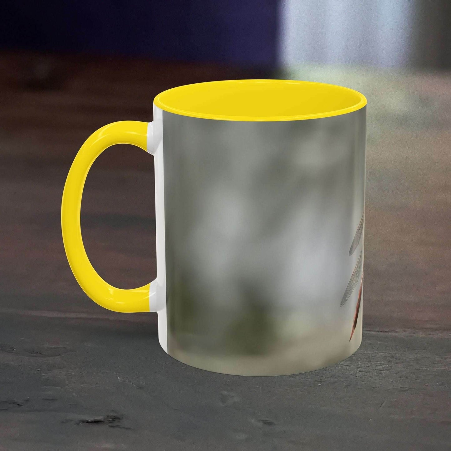 White ceramic mug with pretty dragonfly design, 11oz capacity, featuring yellow interior and handle.
