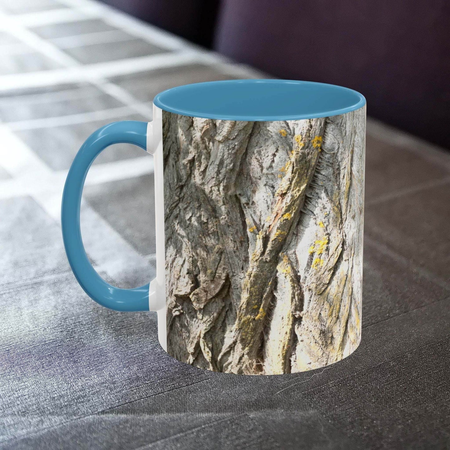 Coffee mug with tree trunk design and blue interior, perfect for nature lovers and rustic decor.