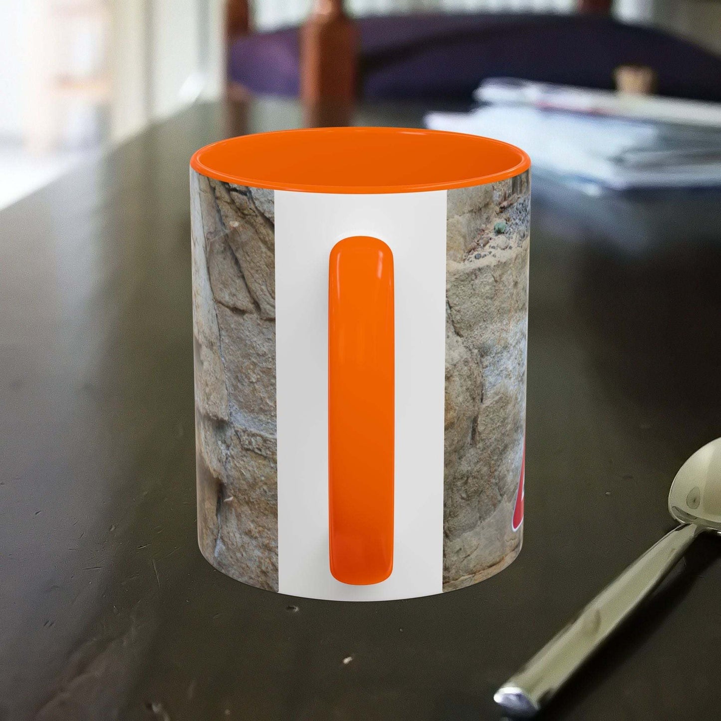 Rocky Mug with falling rocks design, perfect for mountain and nature lovers.
