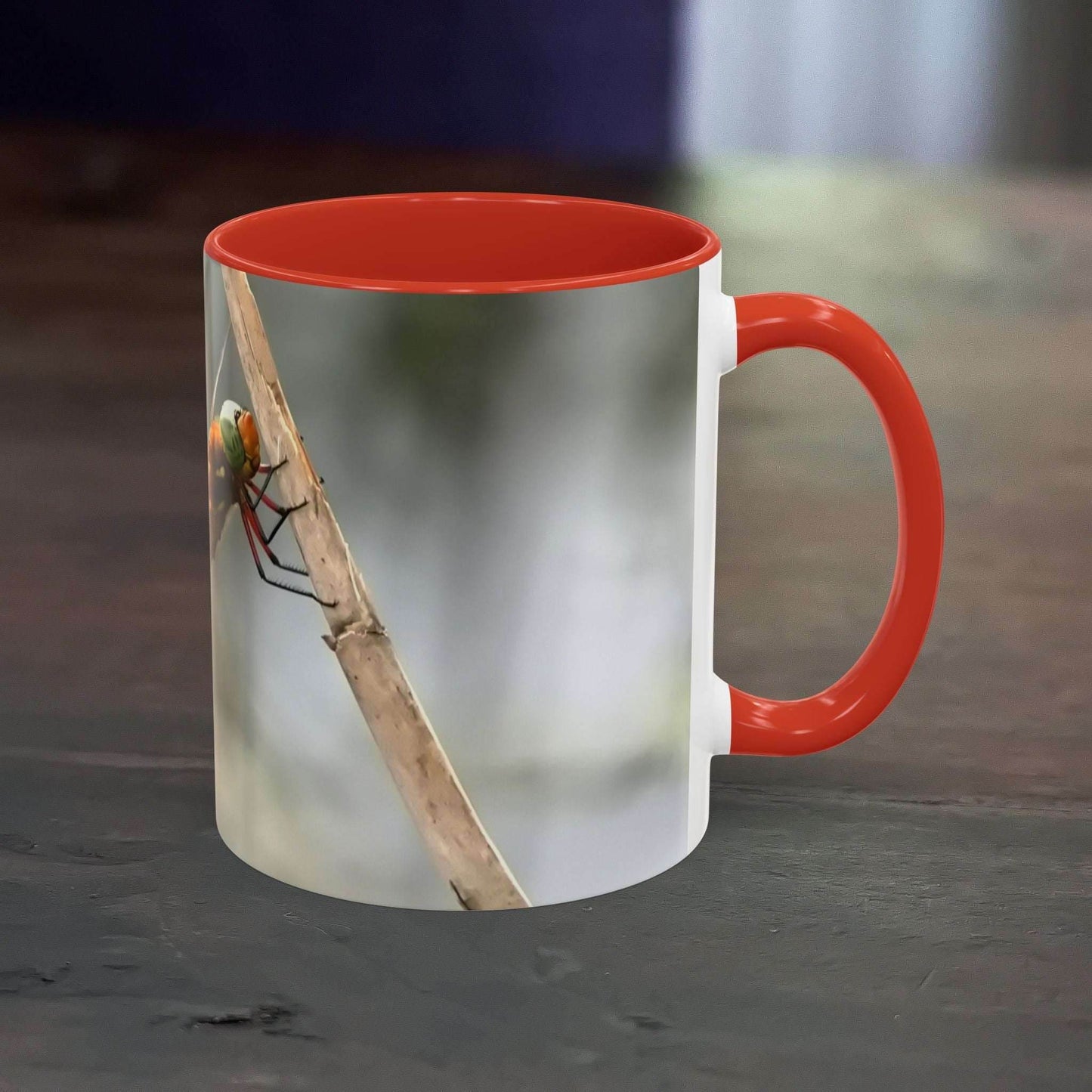 White ceramic mug with pretty dragonfly design and red interior, 11oz capacity.