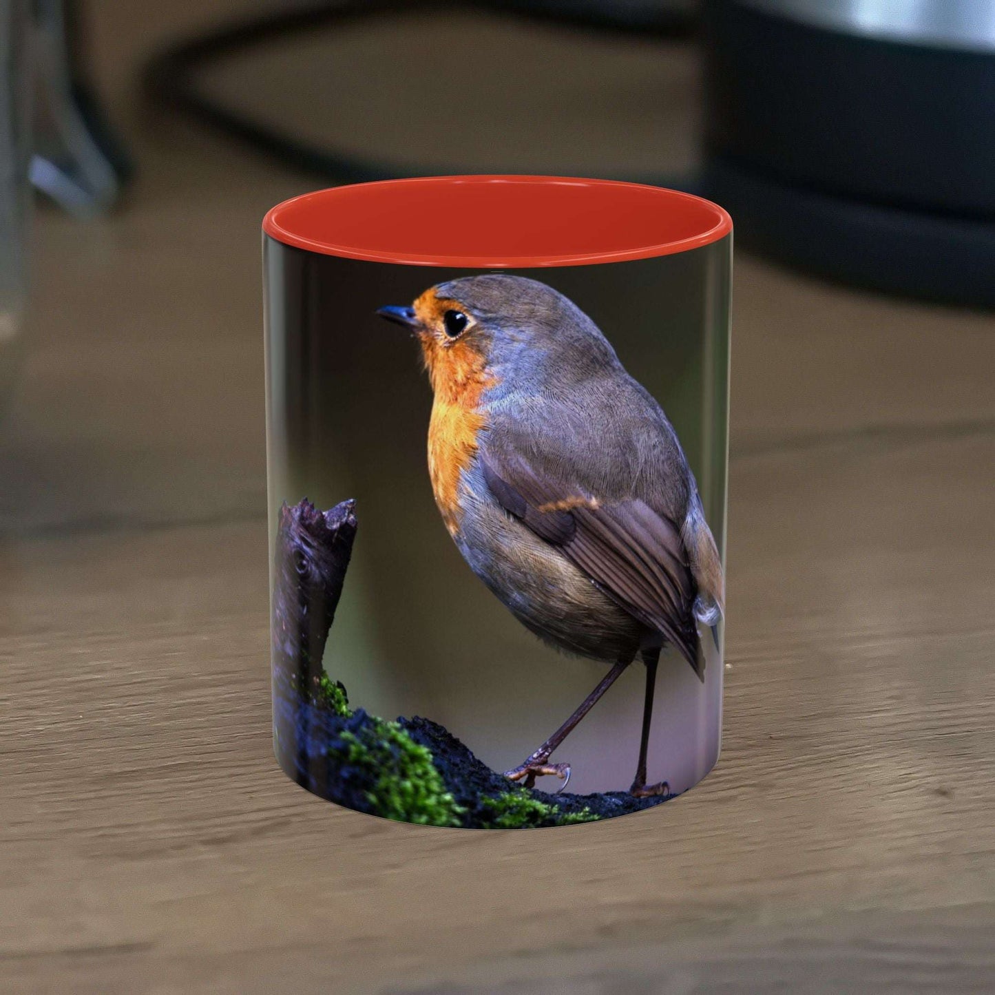White ceramic 11oz mug with vibrant robin illustration, microwave and dishwasher safe.