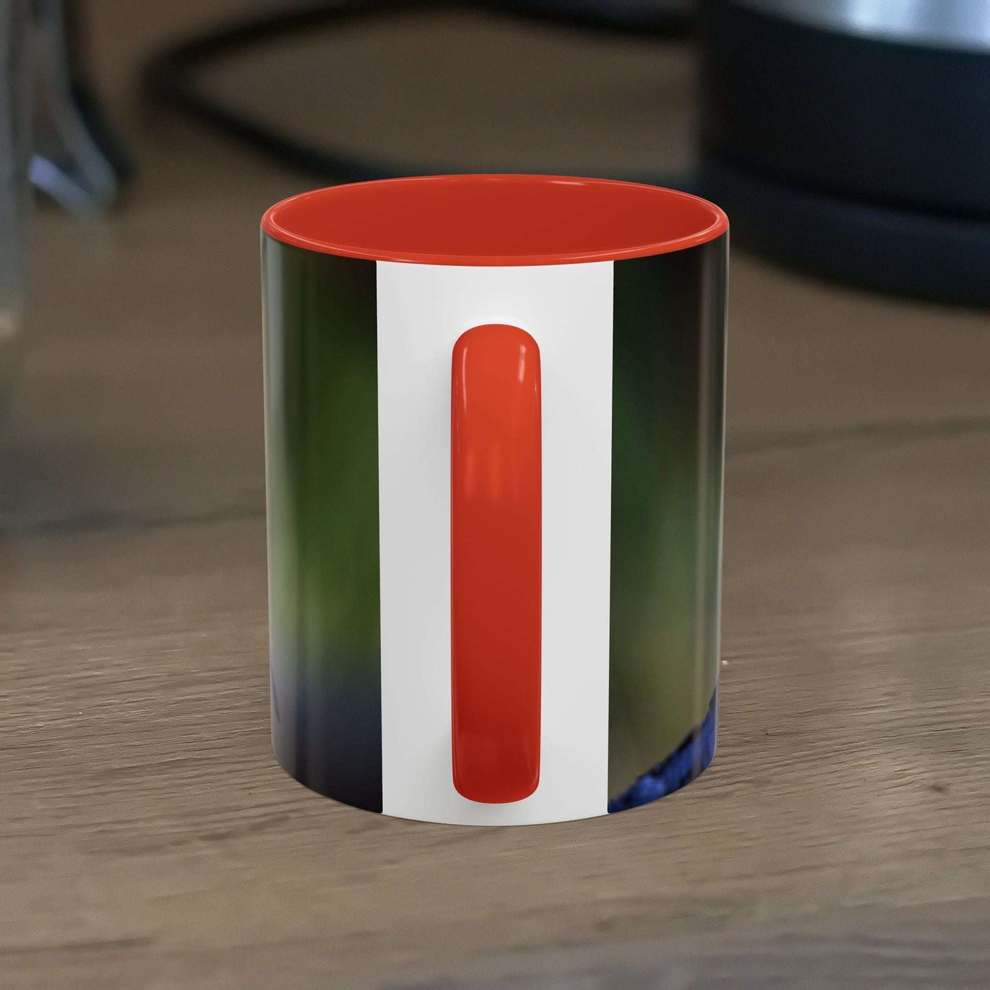 White ceramic 11oz Robin Mug with vibrant robin illustration.