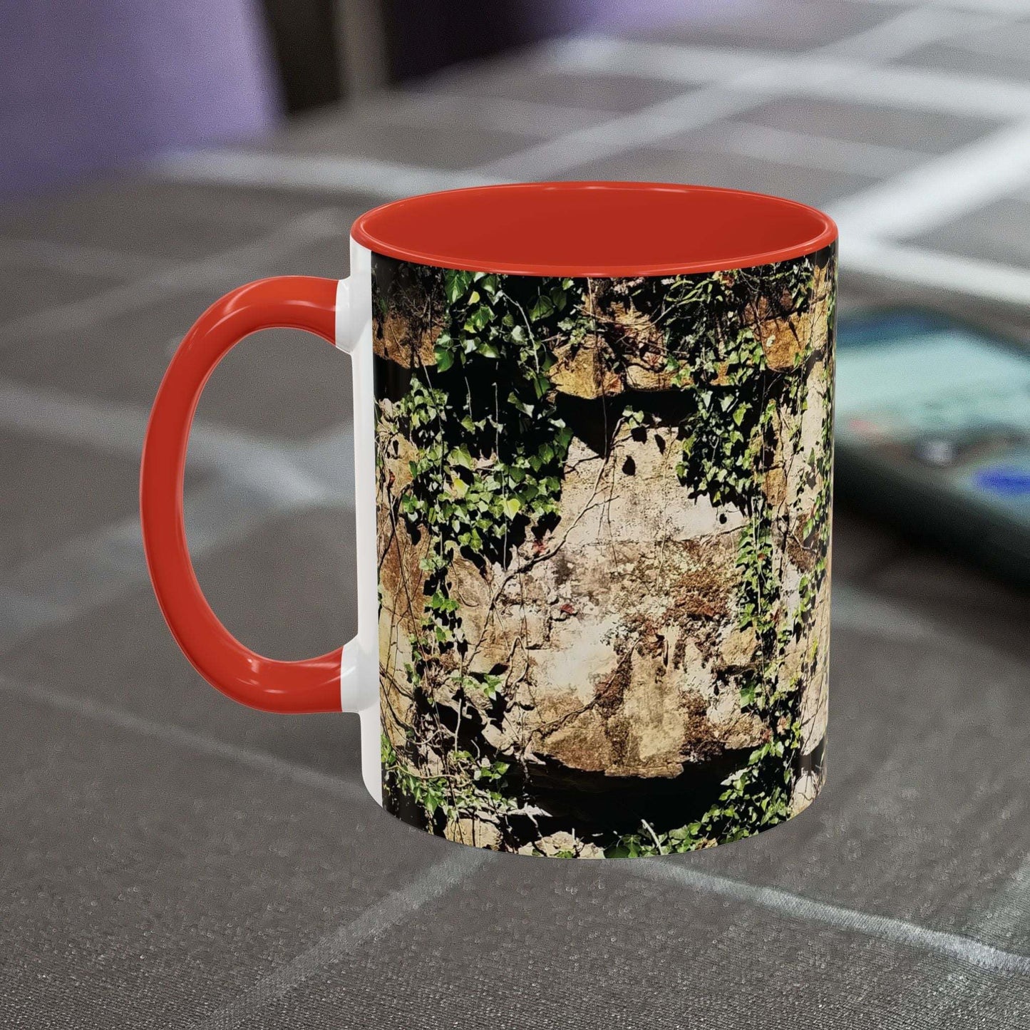 Overgrown Rocks Adventure Mug with nature-inspired design on table.