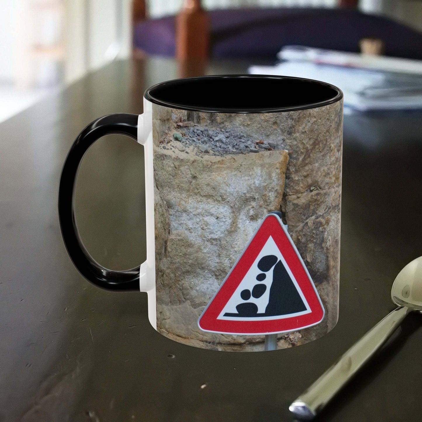 Rocky Mug with falling rocks design for mountain lovers and hikers.