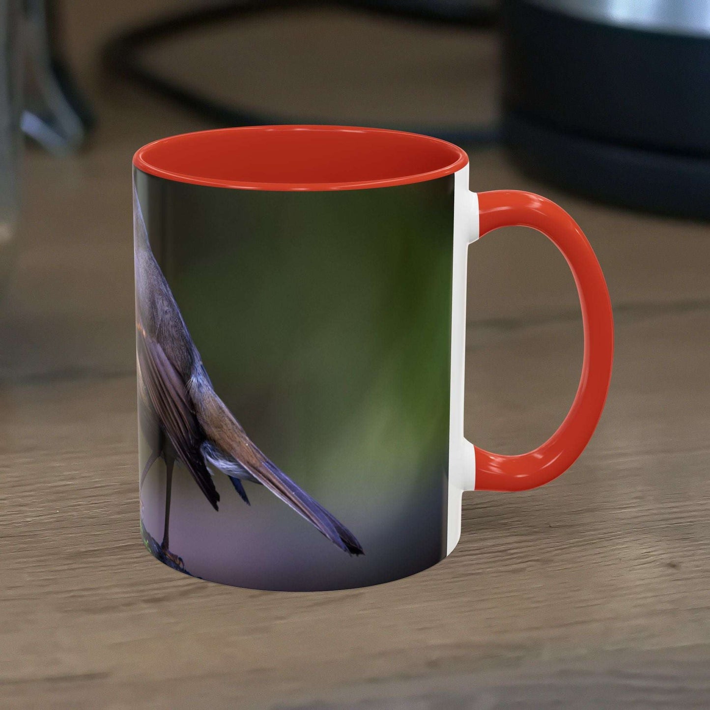 White ceramic 11oz Robin Mug with vibrant bird illustration, perfect for nature lovers.