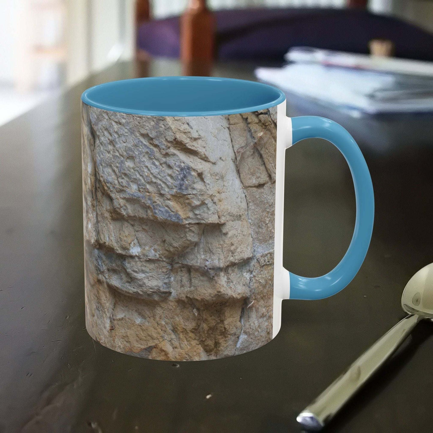 Rocky Mug with mountain and falling rocks design, perfect for nature enthusiasts and hikers.