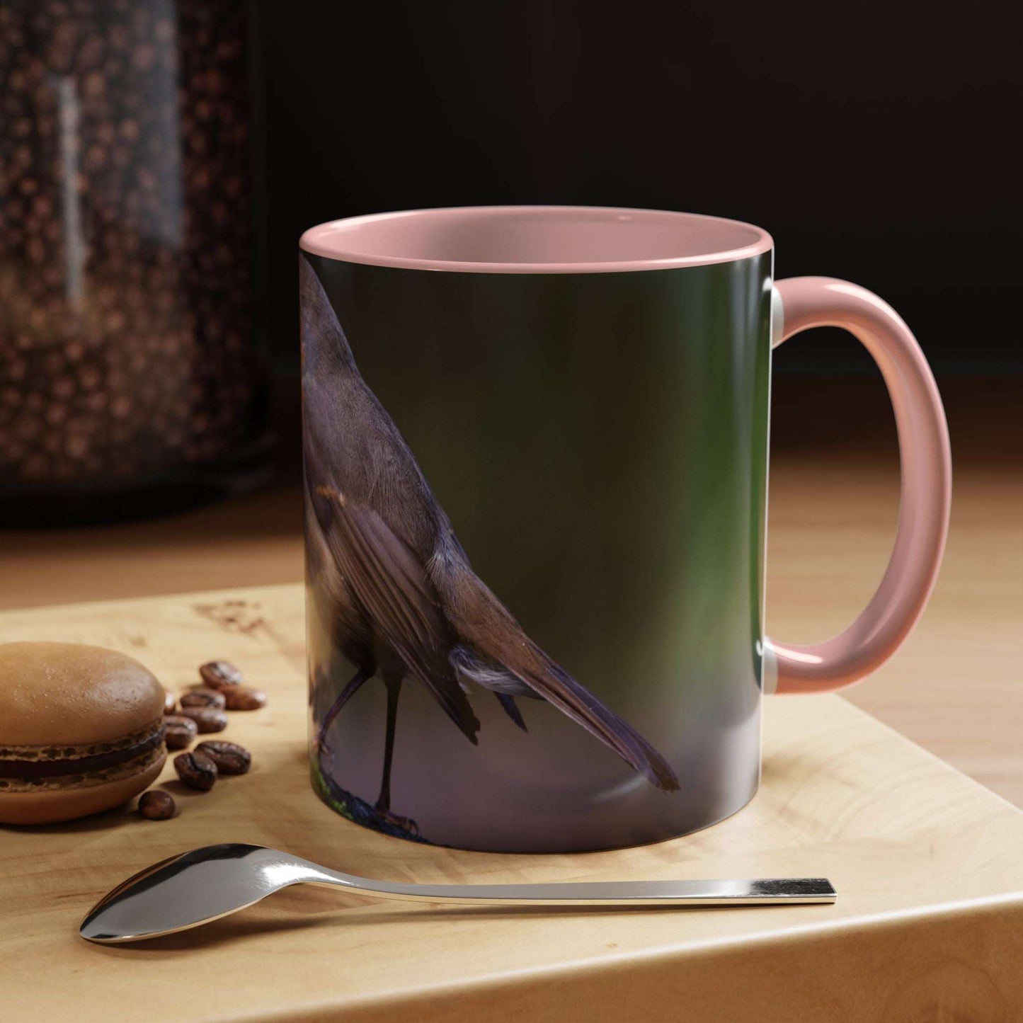 White ceramic 11oz Robin Mug with robin illustration and pink interior.