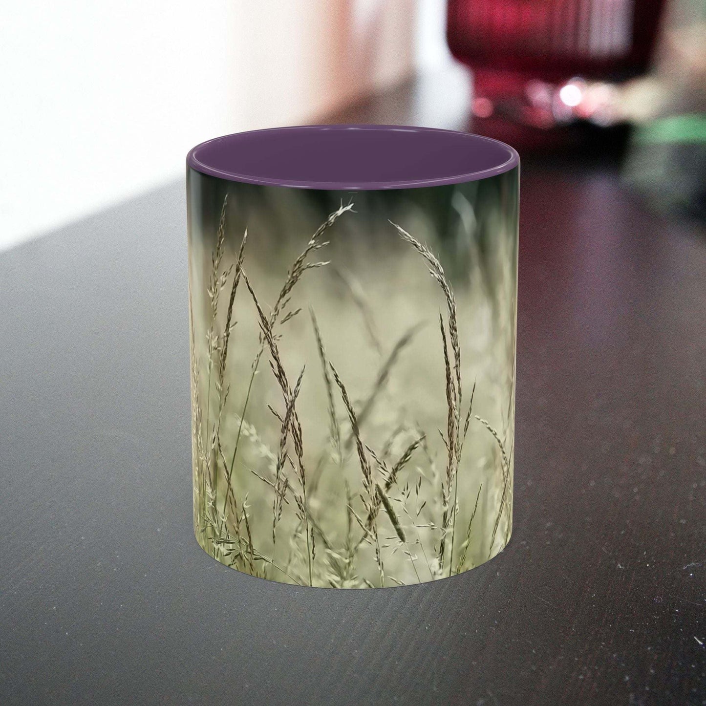 Flowering Grass Mug with natural ceramic design on table.