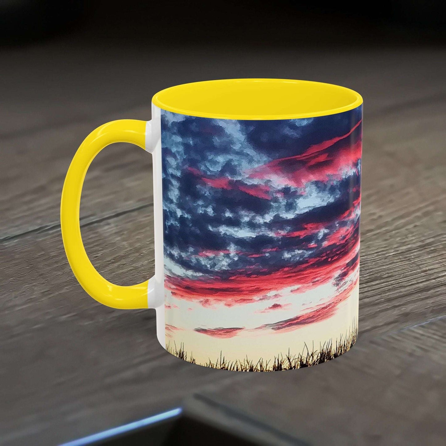 Sunset Accent Coffee Mug with vibrant sky design and yellow interior, perfect for nature lovers and home office decor.