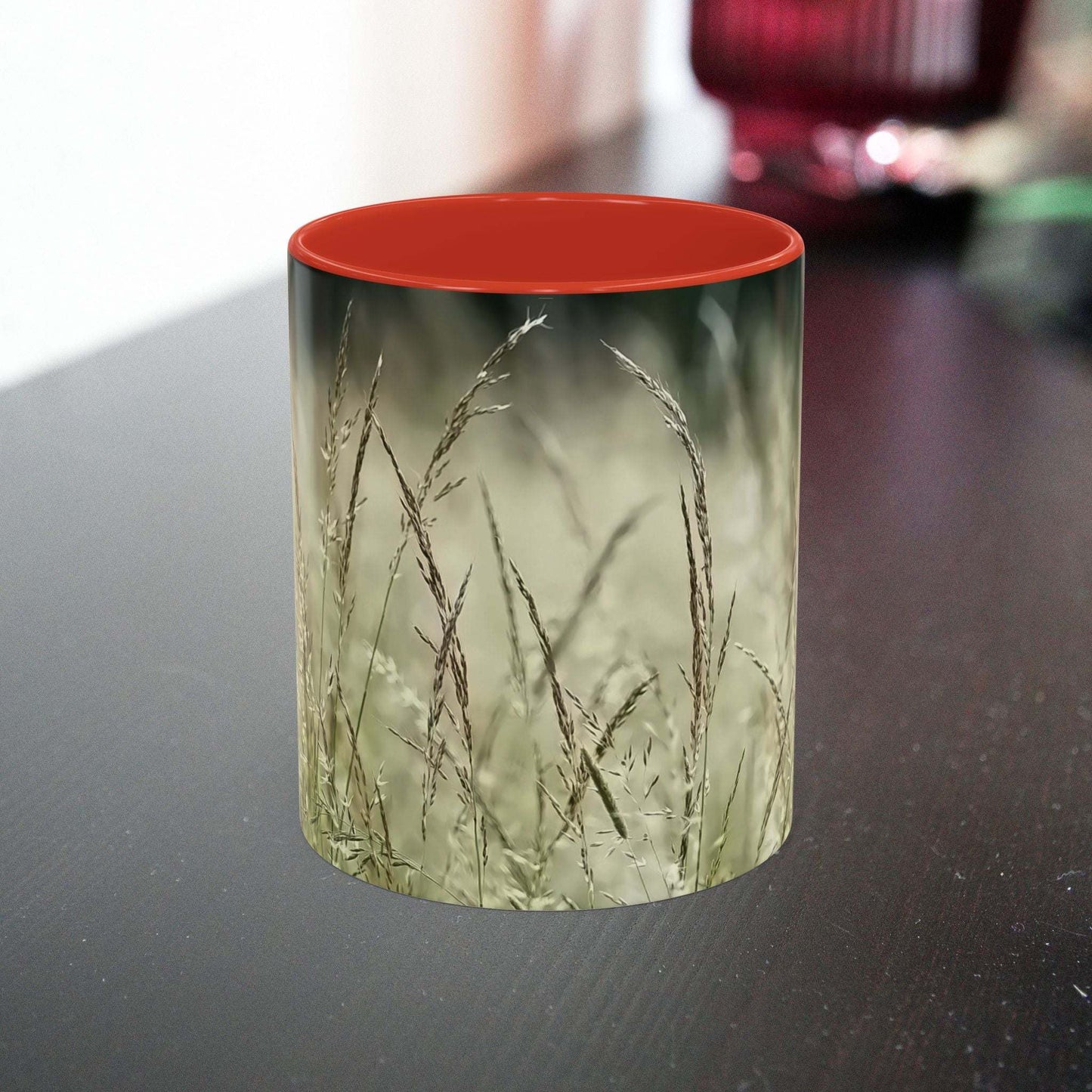 Ceramic mug with flowering grass design, perfect for nature lovers.