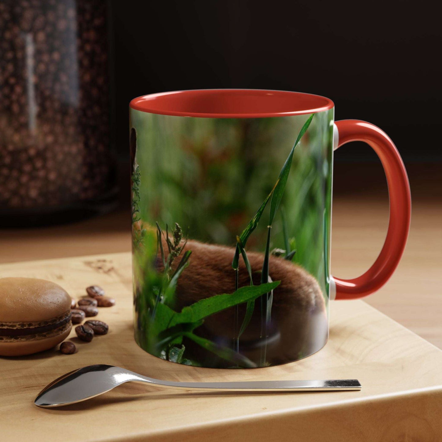 Wildlife Fox Ceramic Mug on wooden table with spoon and coffee beans nearby.