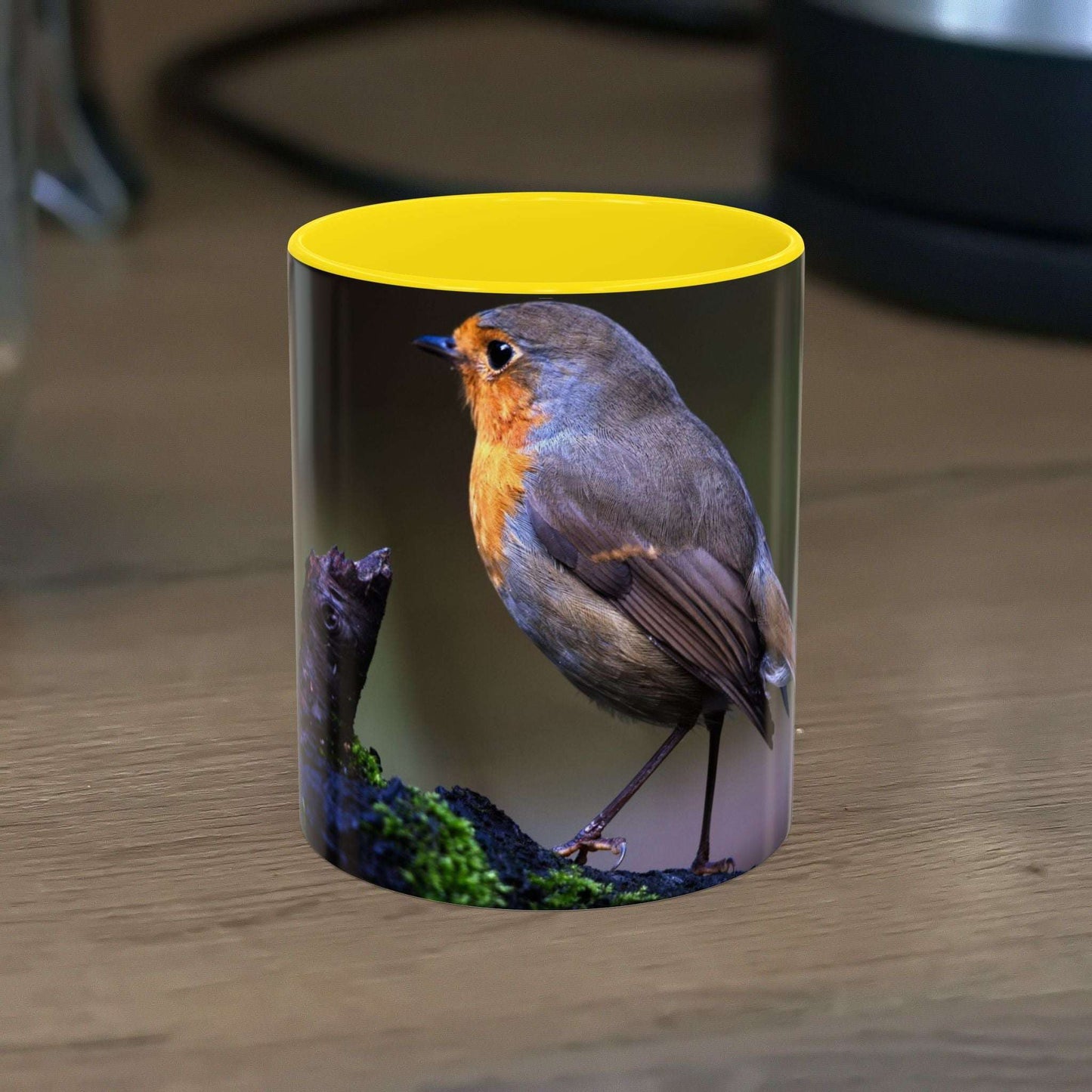 White ceramic 11oz mug with vibrant robin illustration, perfect for nature lovers.