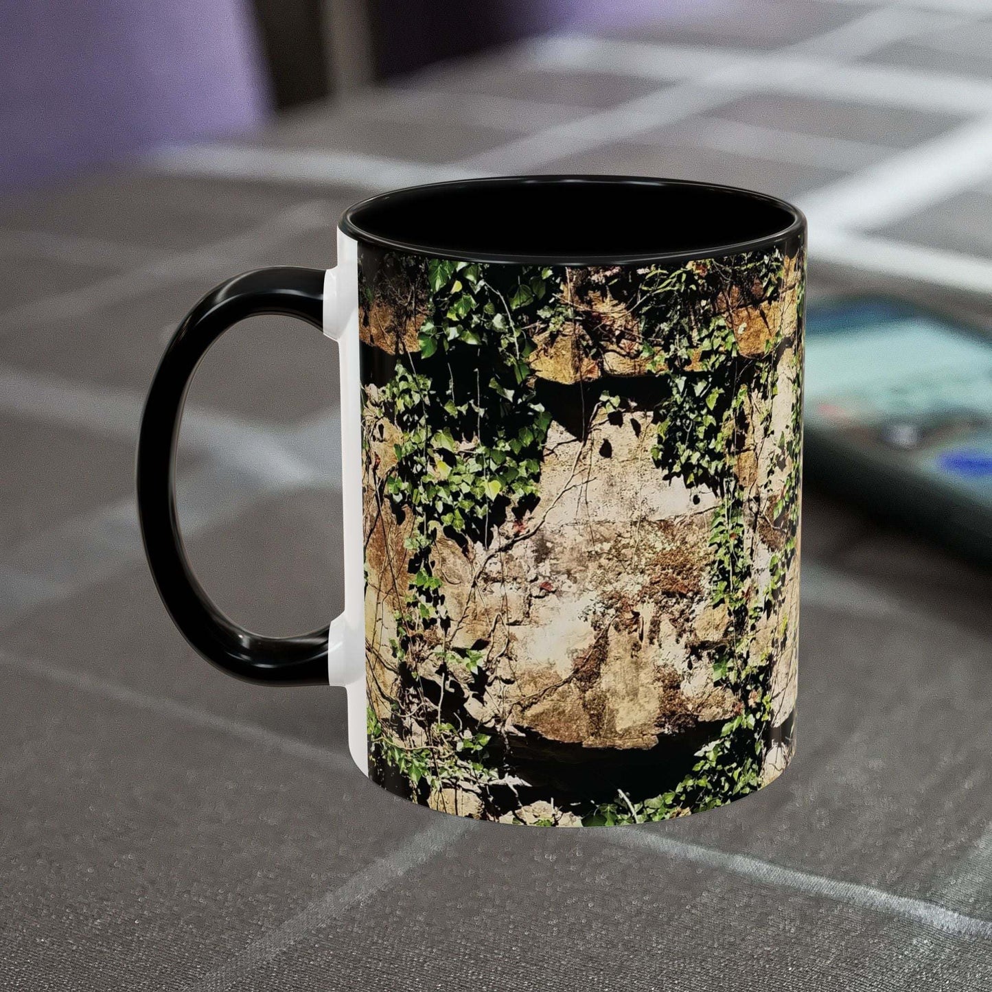 Overgrown Rocks Adventure Mug with nature-inspired design on a table.
