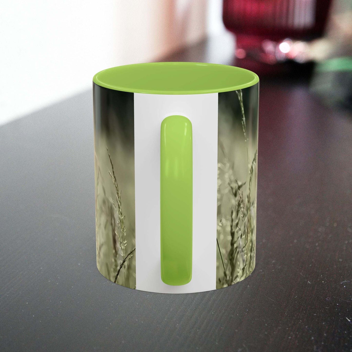 Ceramic mug with flowering grass design, ideal for nature lovers.