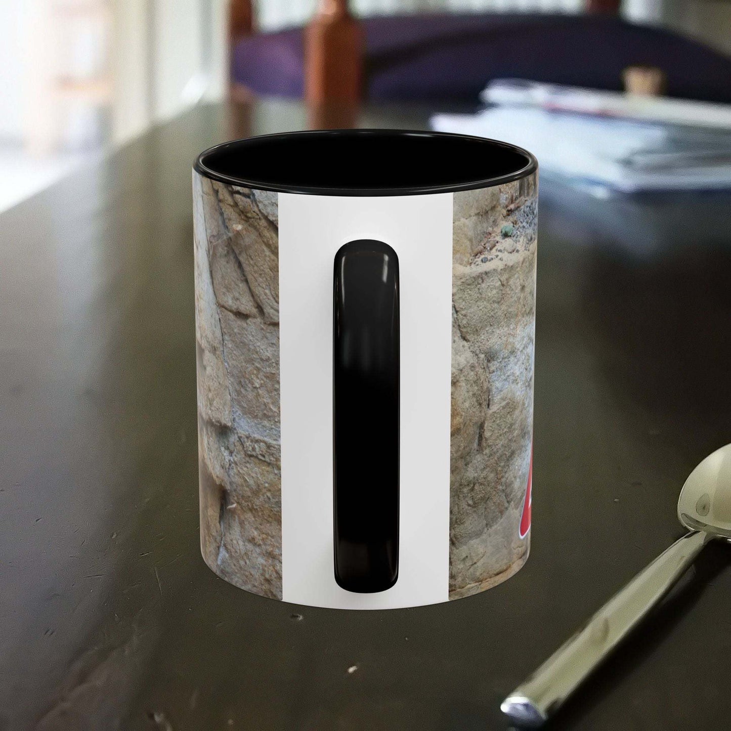 Rocky Mug with falling rocks design, perfect for mountain lovers and outdoor enthusiasts.