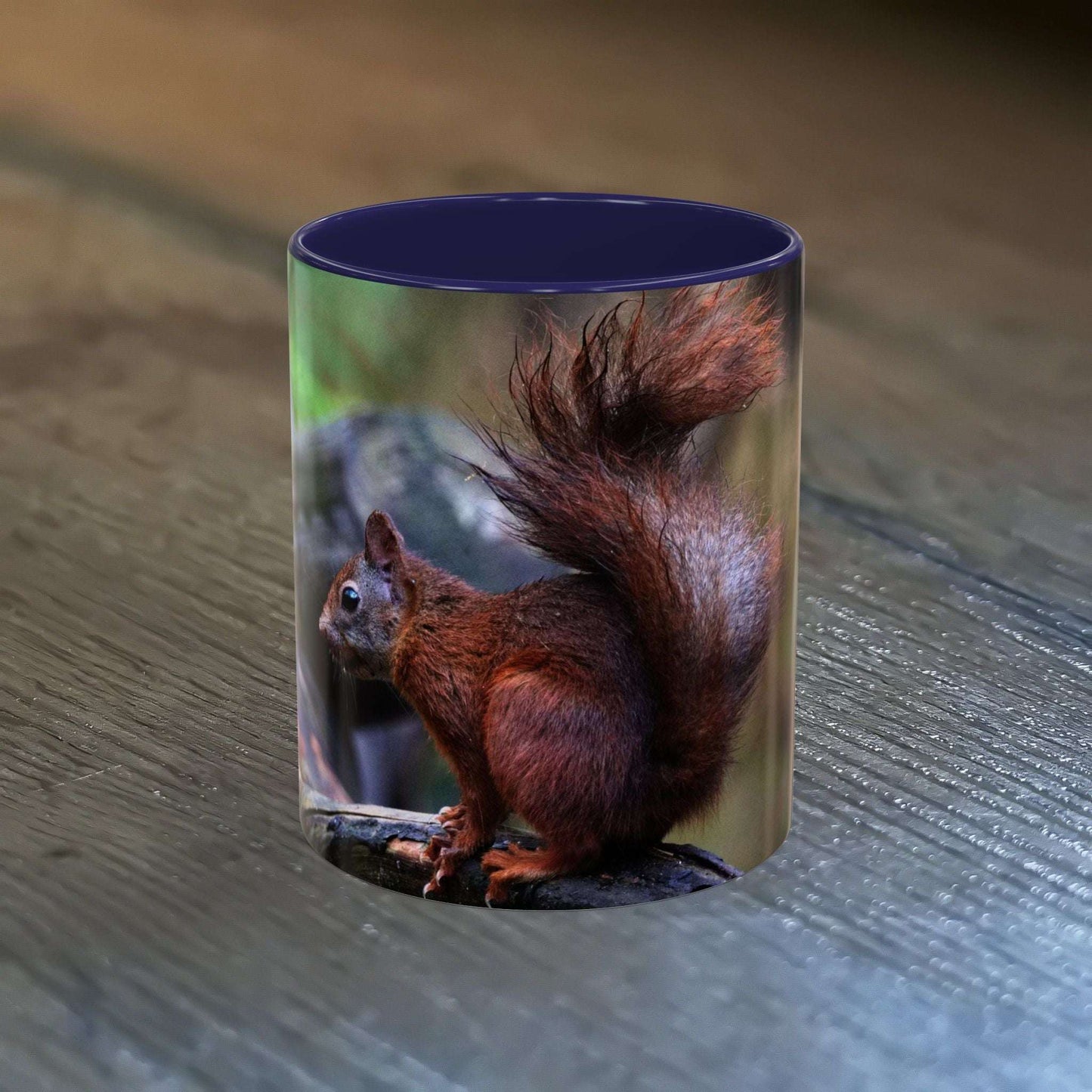 Adorable squirrel ceramic mug on a wooden surface, featuring nature-inspired artwork and a glossy finish.