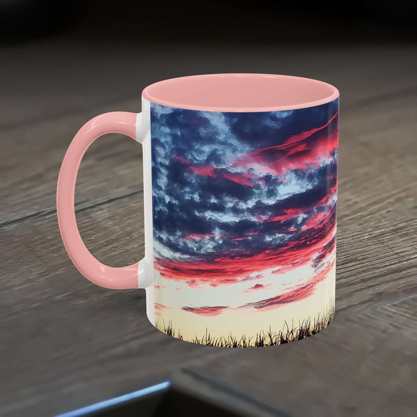 Sunset Accent Coffee Mug with artistic design, vibrant colors, glossy finish, and C-shaped handle.