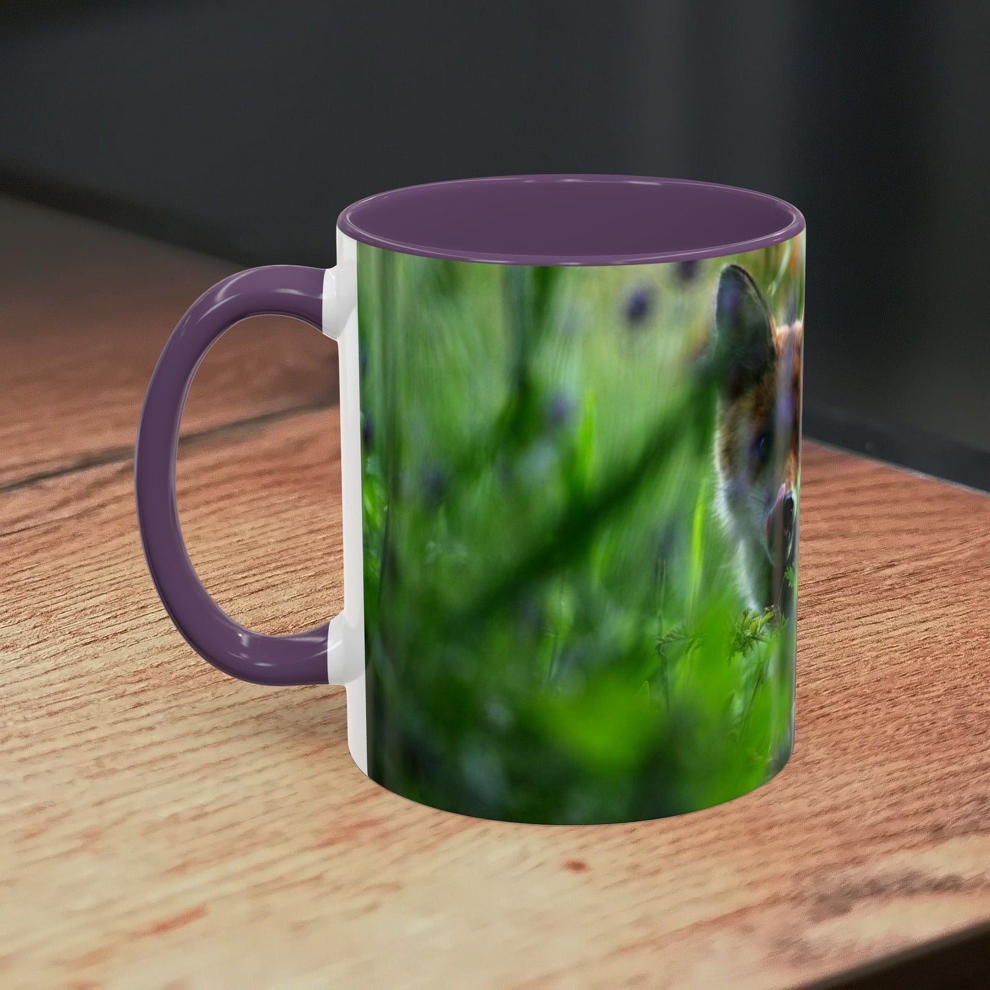 Fox-inspired accent coffee mug with wildlife design and purple handle.