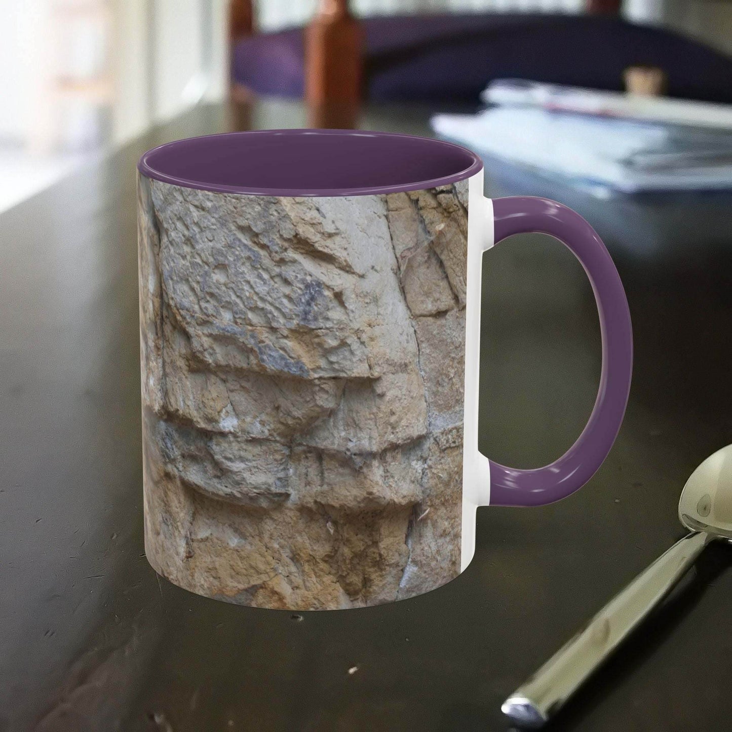 Rocky Mug featuring mountain design with falling rocks theme, ideal for nature lovers and hikers.