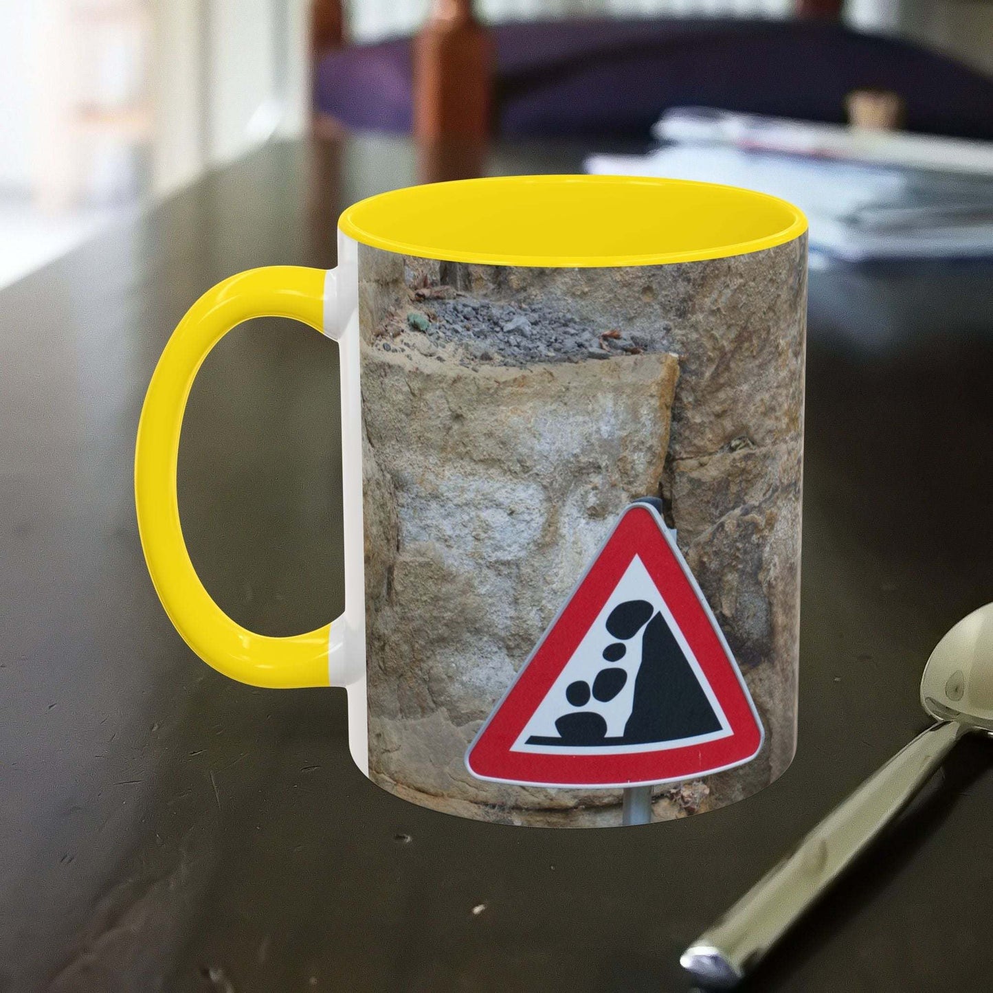 Rocky Mug with falling rocks design, ideal for mountain lovers and outdoor enthusiasts.