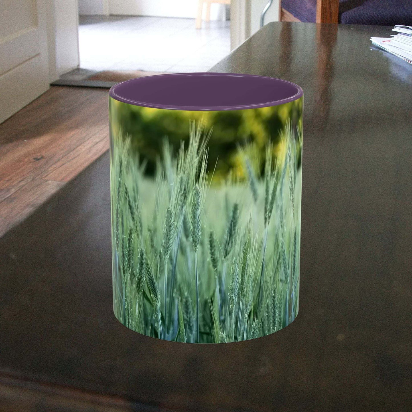 Wheat Field Design coffee mug with nature-inspired print on a table.