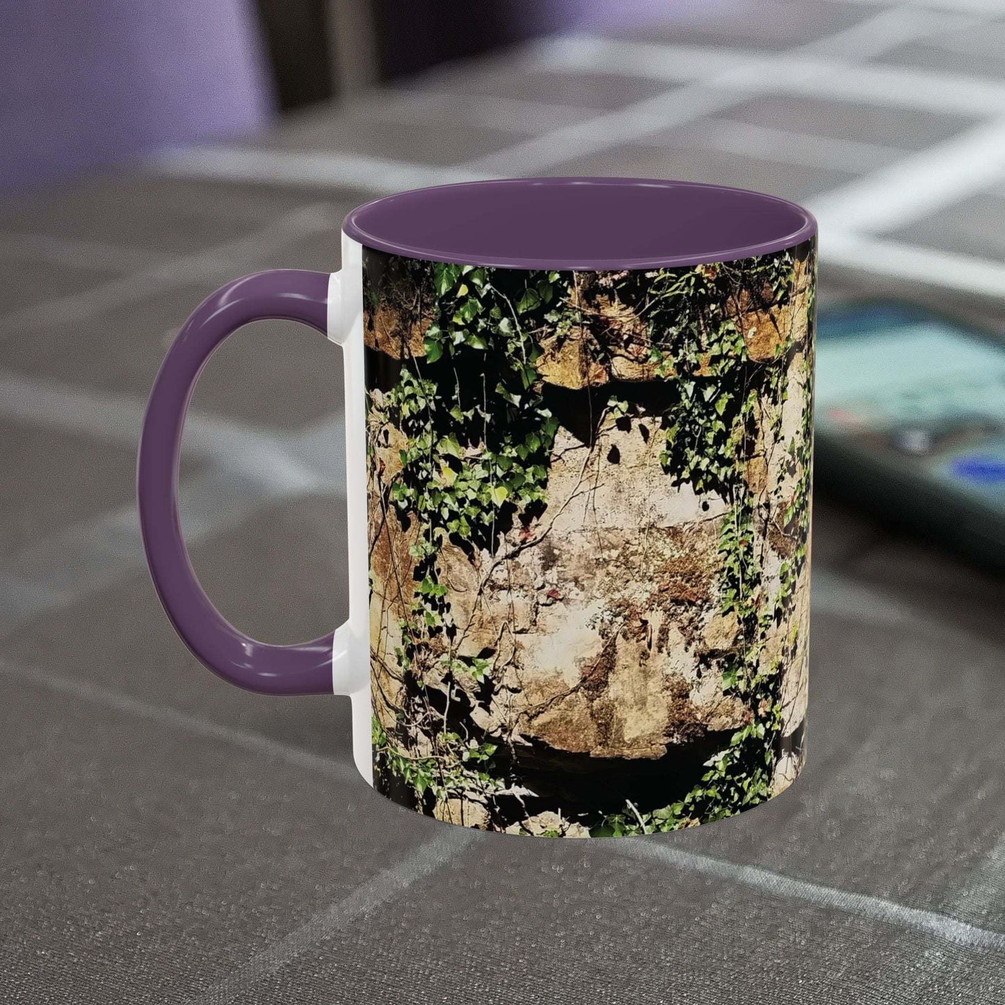 Overgrown Rocks Adventure Mug with nature design on a table.