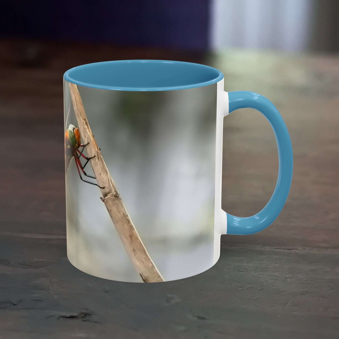 Pretty Dragonfly Accent Coffee Mug with blue interior and handle.