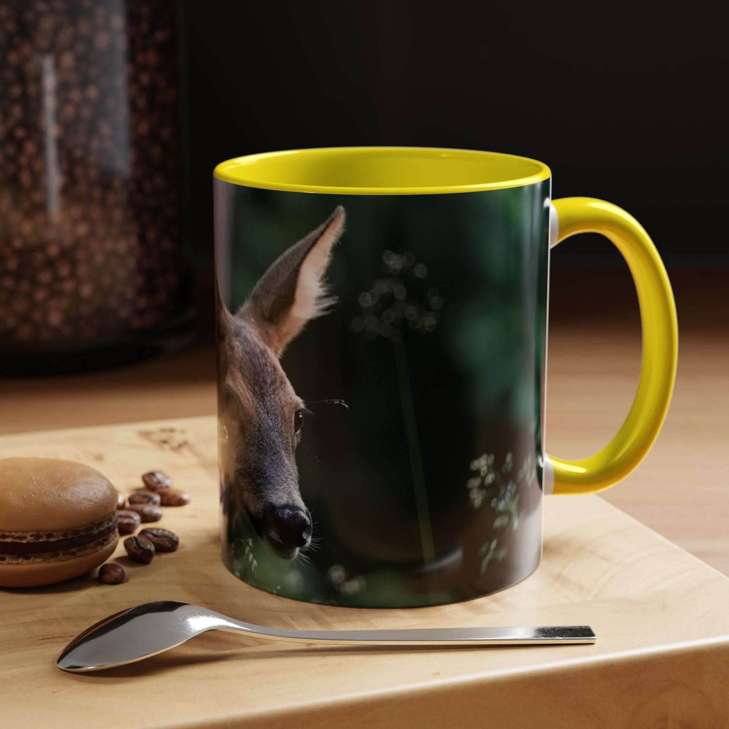 Nature-inspired deer ceramic mug with floral accents, 11oz size, featuring elegant deer design, on wooden surface with coffee beans and macaron.