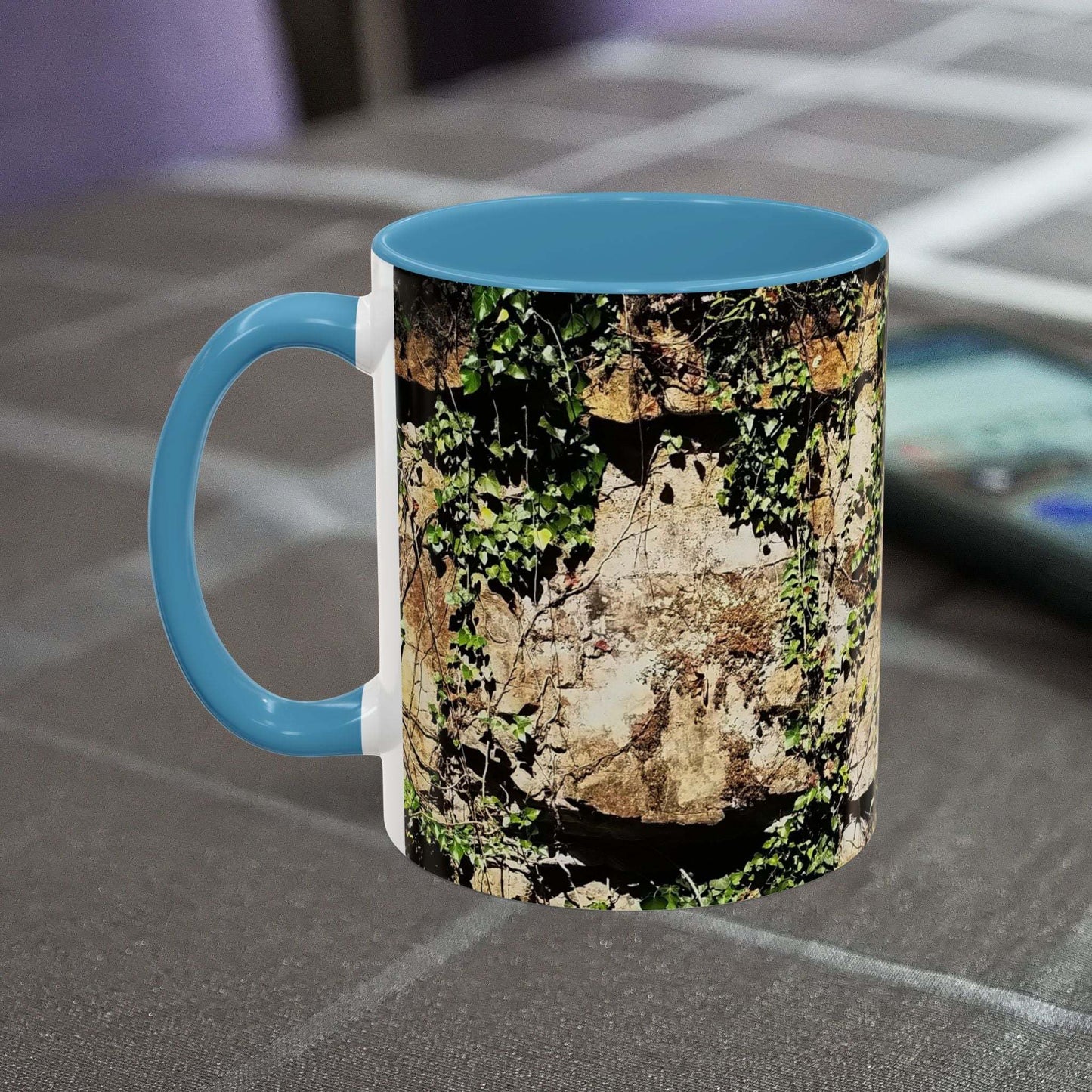 Adventure coffee mug with overgrown rocks design, perfect for nature enthusiasts.