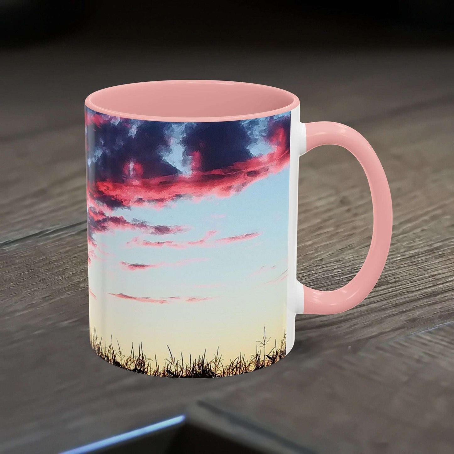 Vibrant sunset accent coffee mug with artistic design and glossy finish.