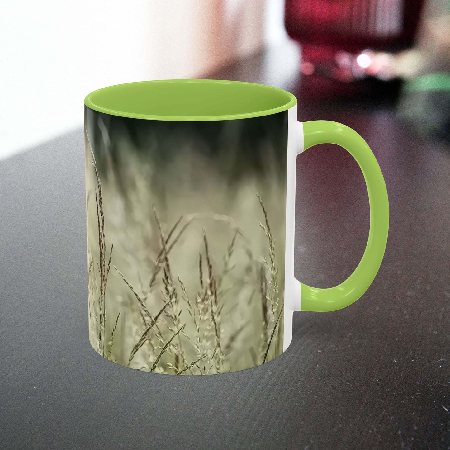 Ceramic mug with a flowering grass design, nature-themed accent piece.