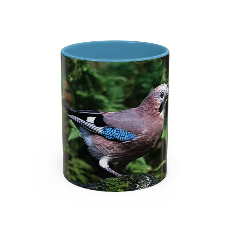 325ml bunter Eichelhäher Becher mit hellblauem Henkel und hellblauer Innenseite.