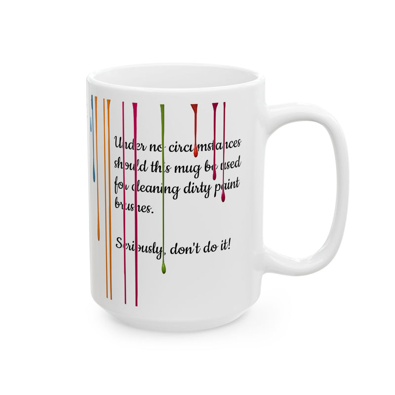 Sturdy 15oz white Paint Drips Mug, Ceramic Coffee Cup next to minimalist nature inspired home decor items.