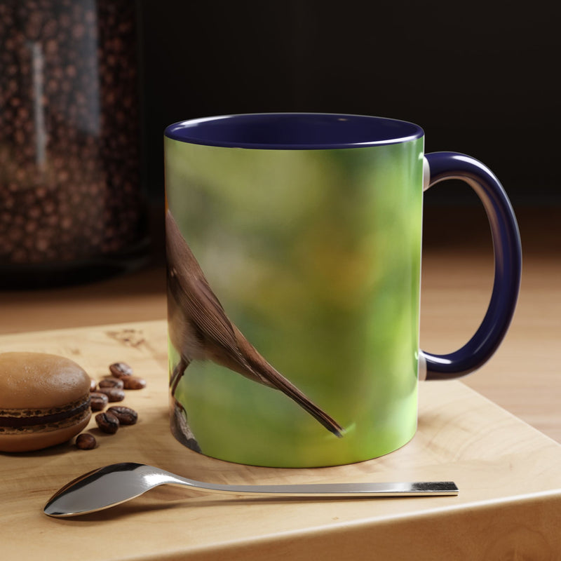 Stately Robin Ceramic Mug 325ml with Navy handle and interior — front view of robin photography mug.